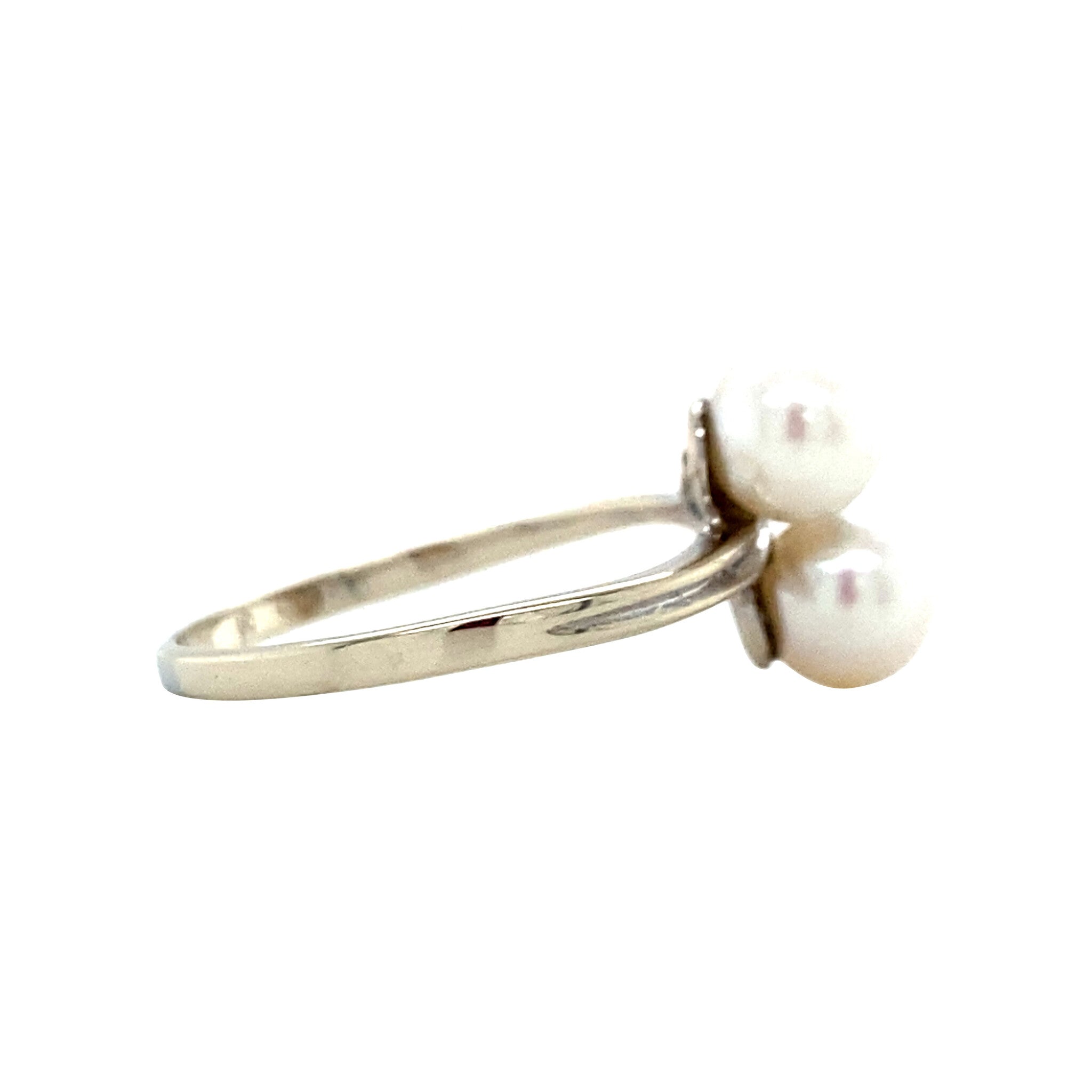 Witgouden vintage ring met parel en diamant 14 krt