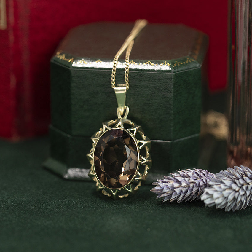 Gouden vintage hanger met rooktopaas 14 kt