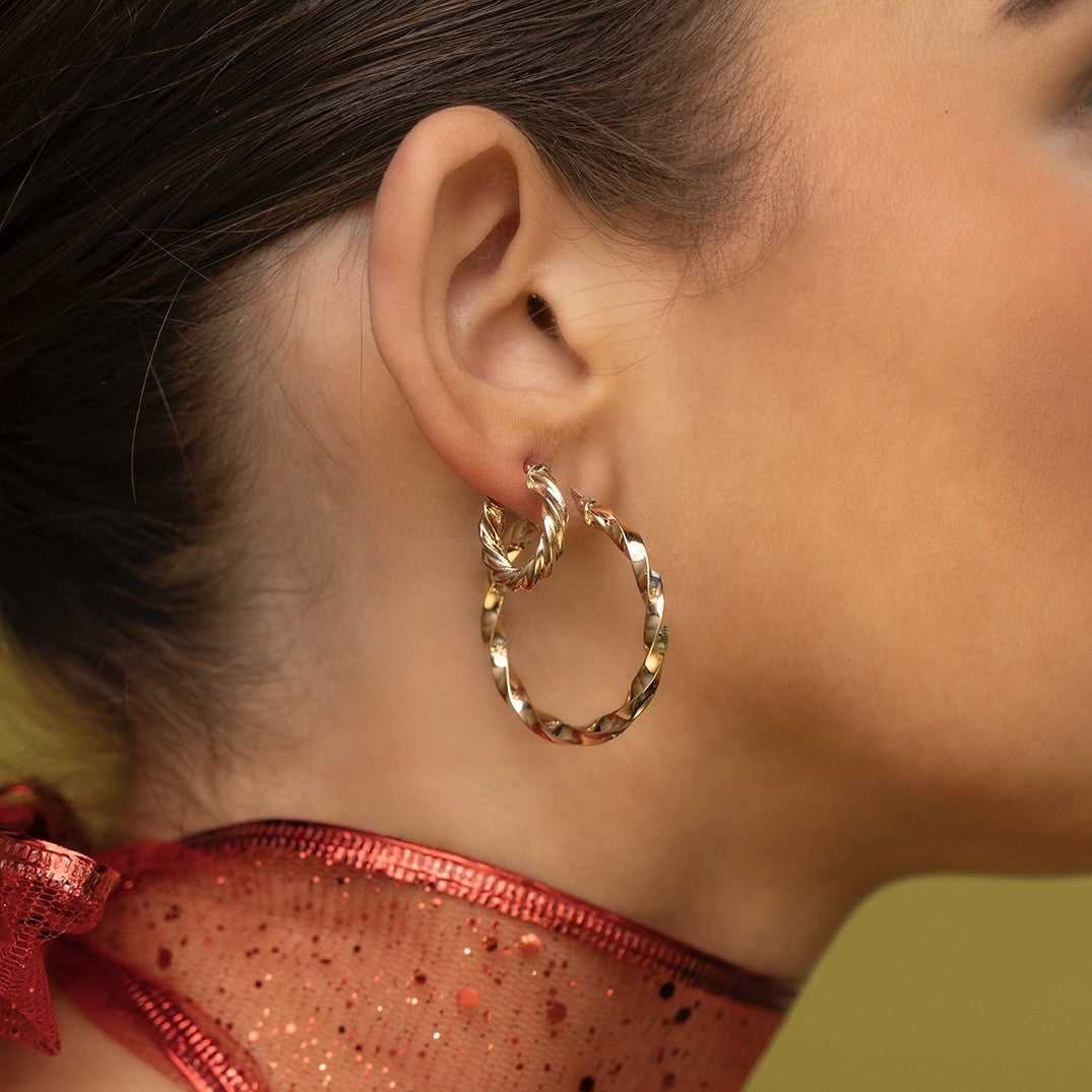 Getordeerde vintage oorringen 9 kt