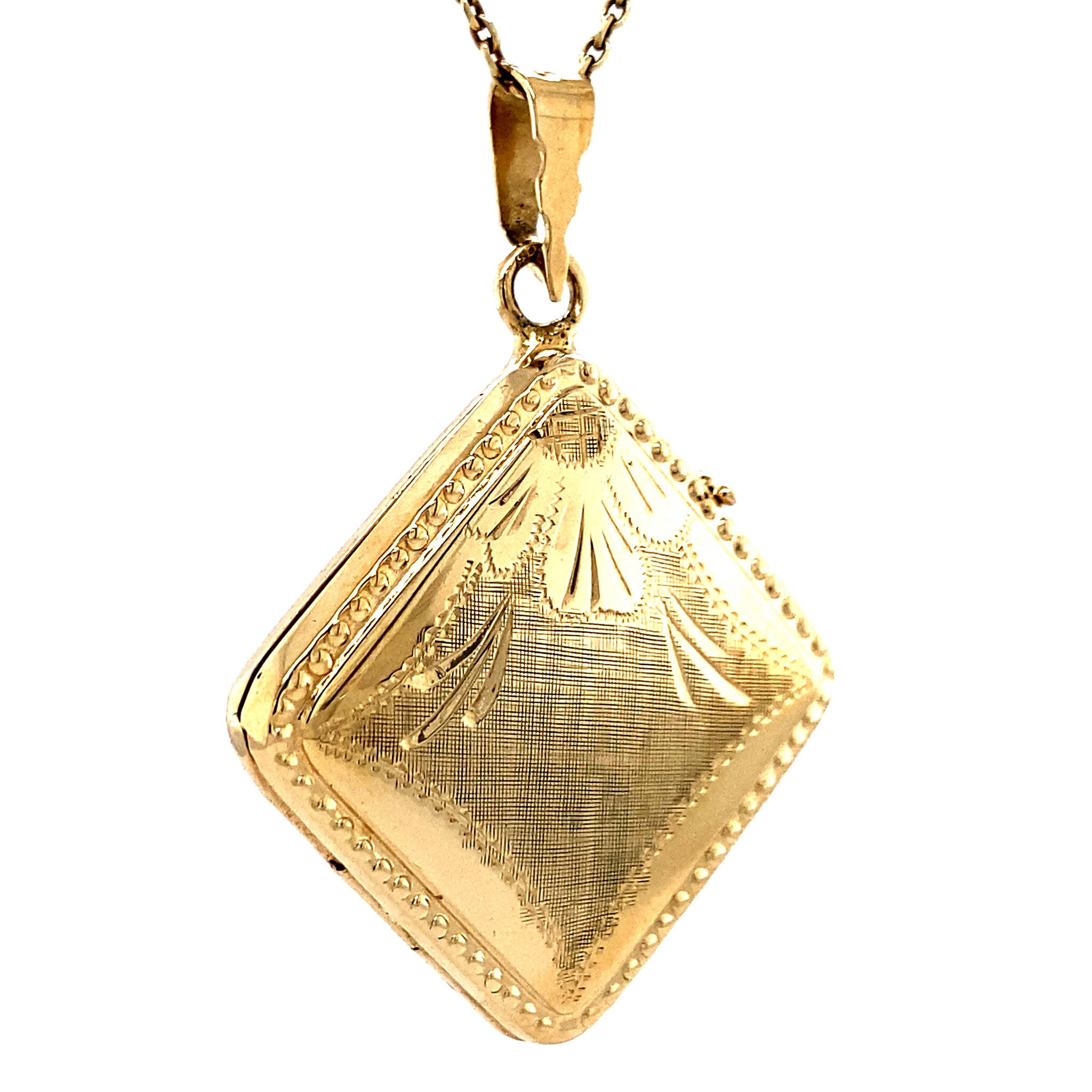 14 kt gold medallion with engraving