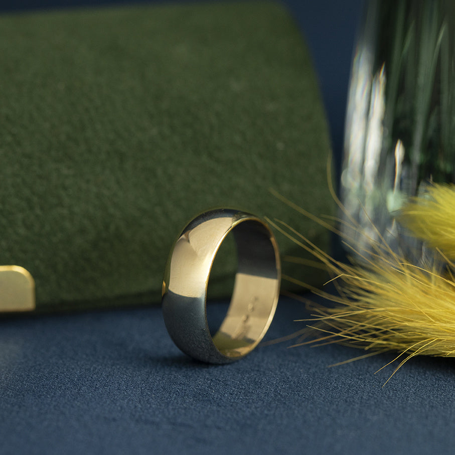 Gouden gladde vintage trouwring 14 krt