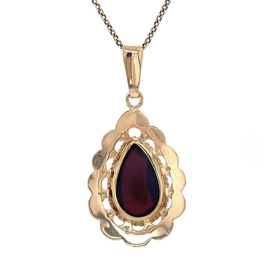 Vintage gold pendant with garnet, 14 kt