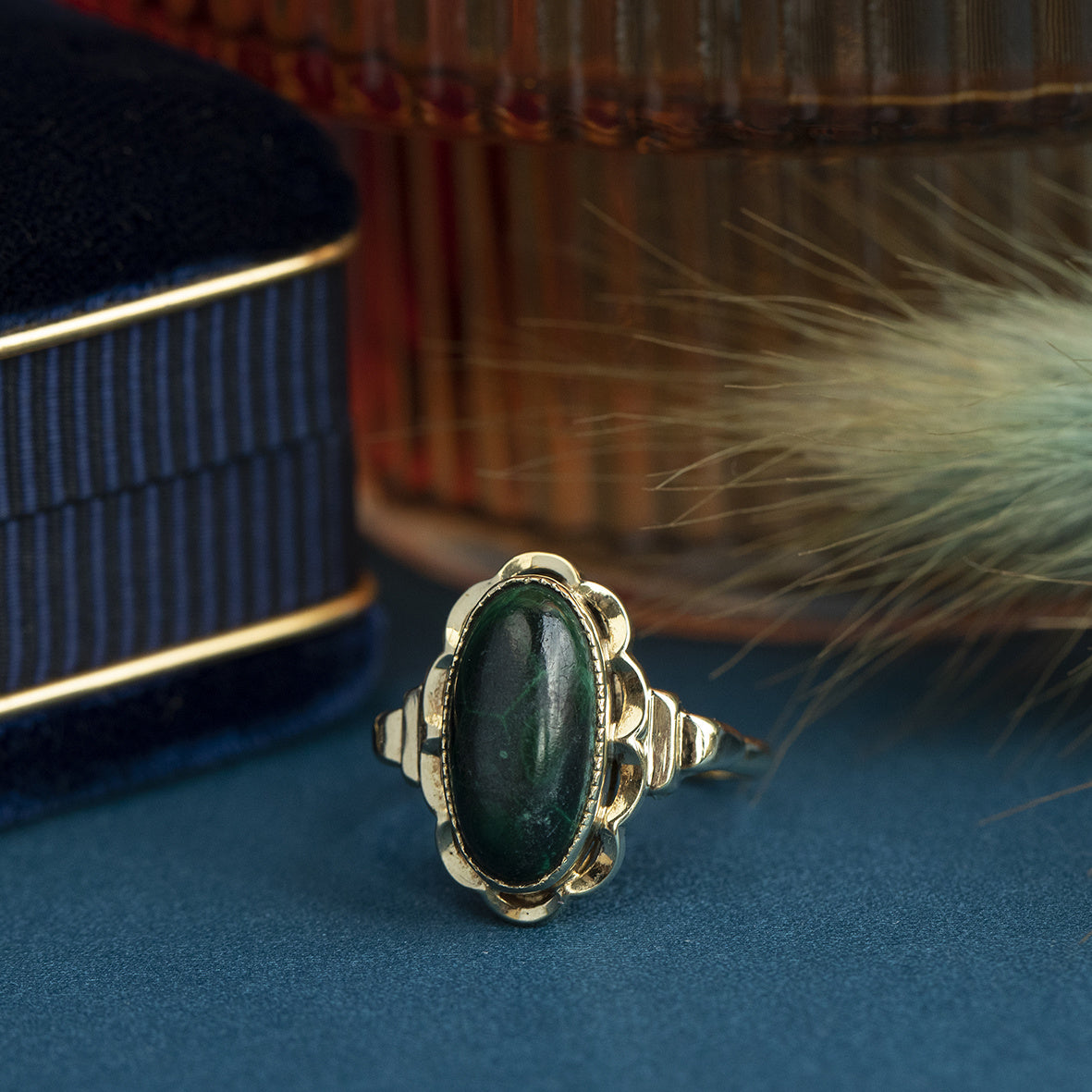 Gold ring with malachite, 14 kt