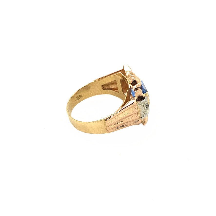 Gouden retro ring met blauwe spinel en zirkonia 18 krt