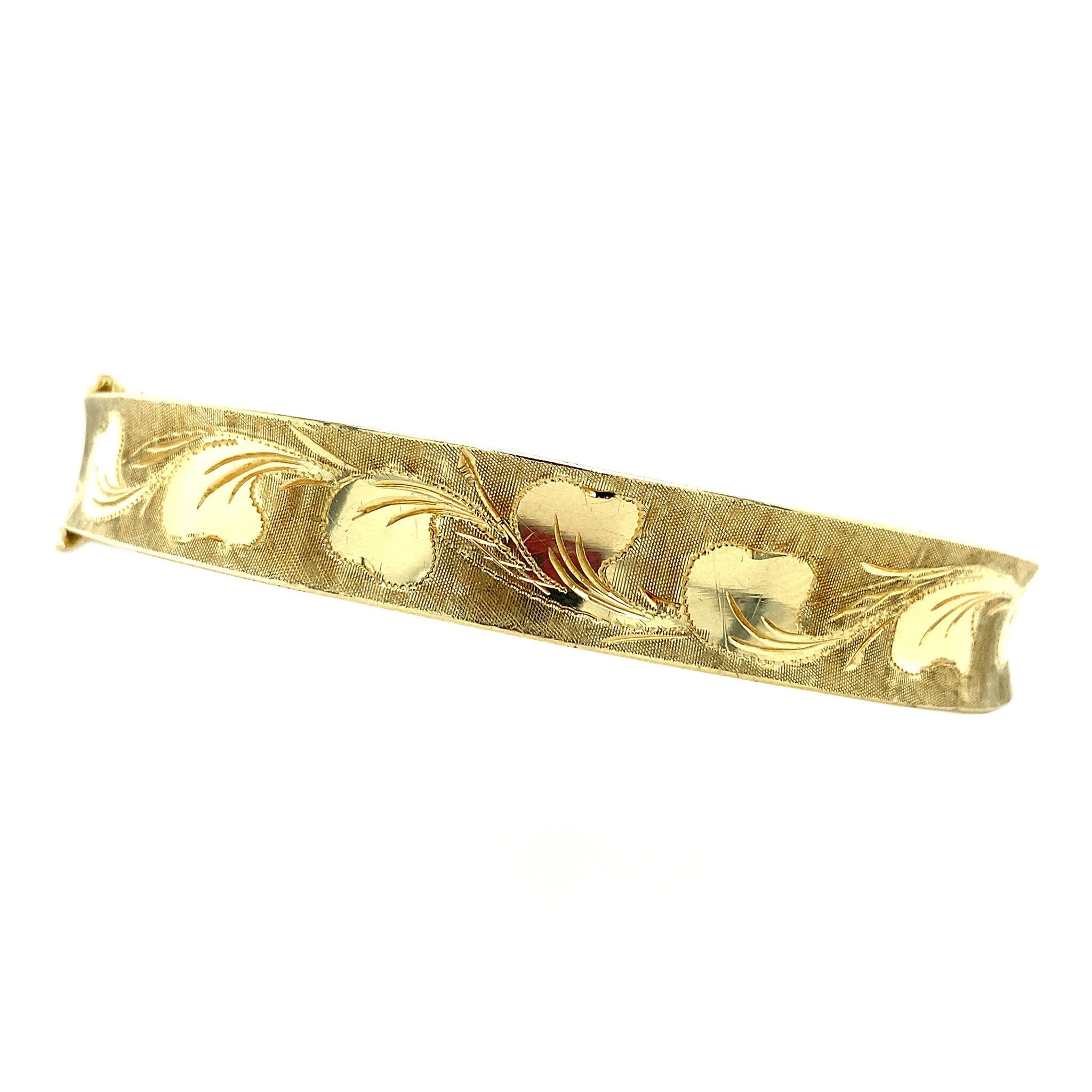 Vintage gold bangle with engraving, 14 kt