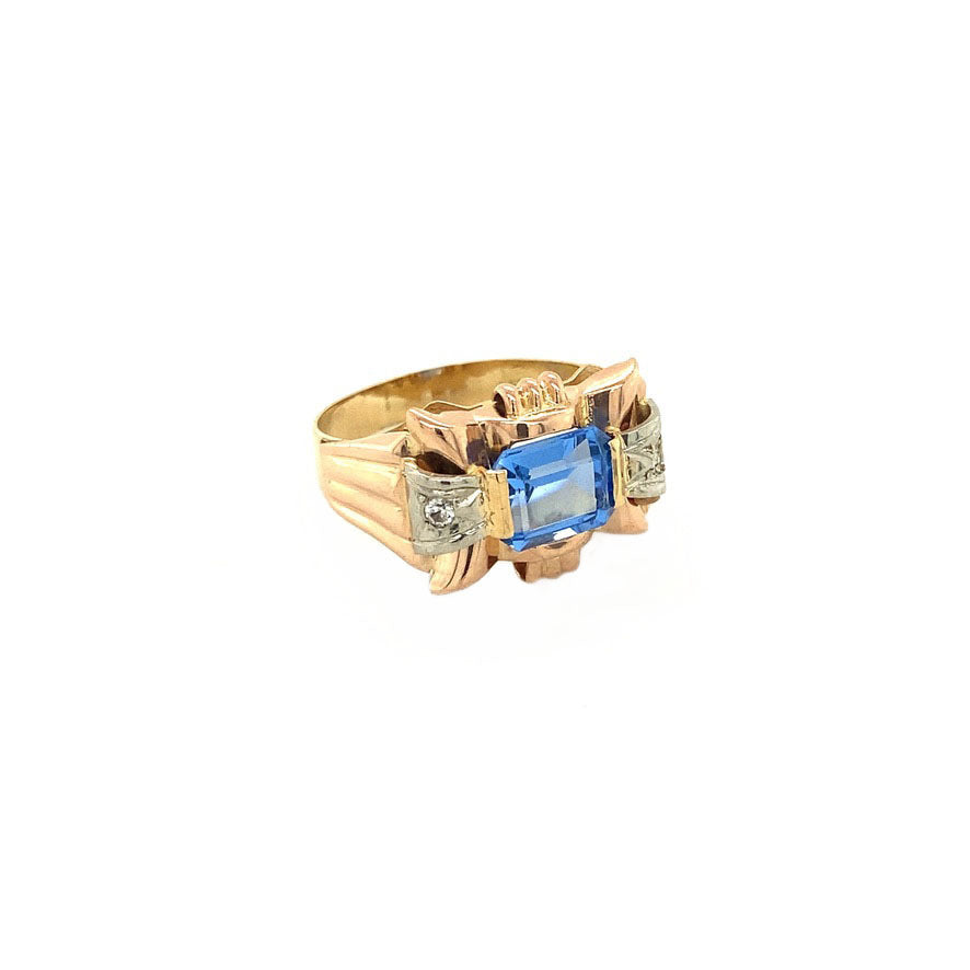 Gouden retro ring met blauwe spinel en zirkonia 18 krt