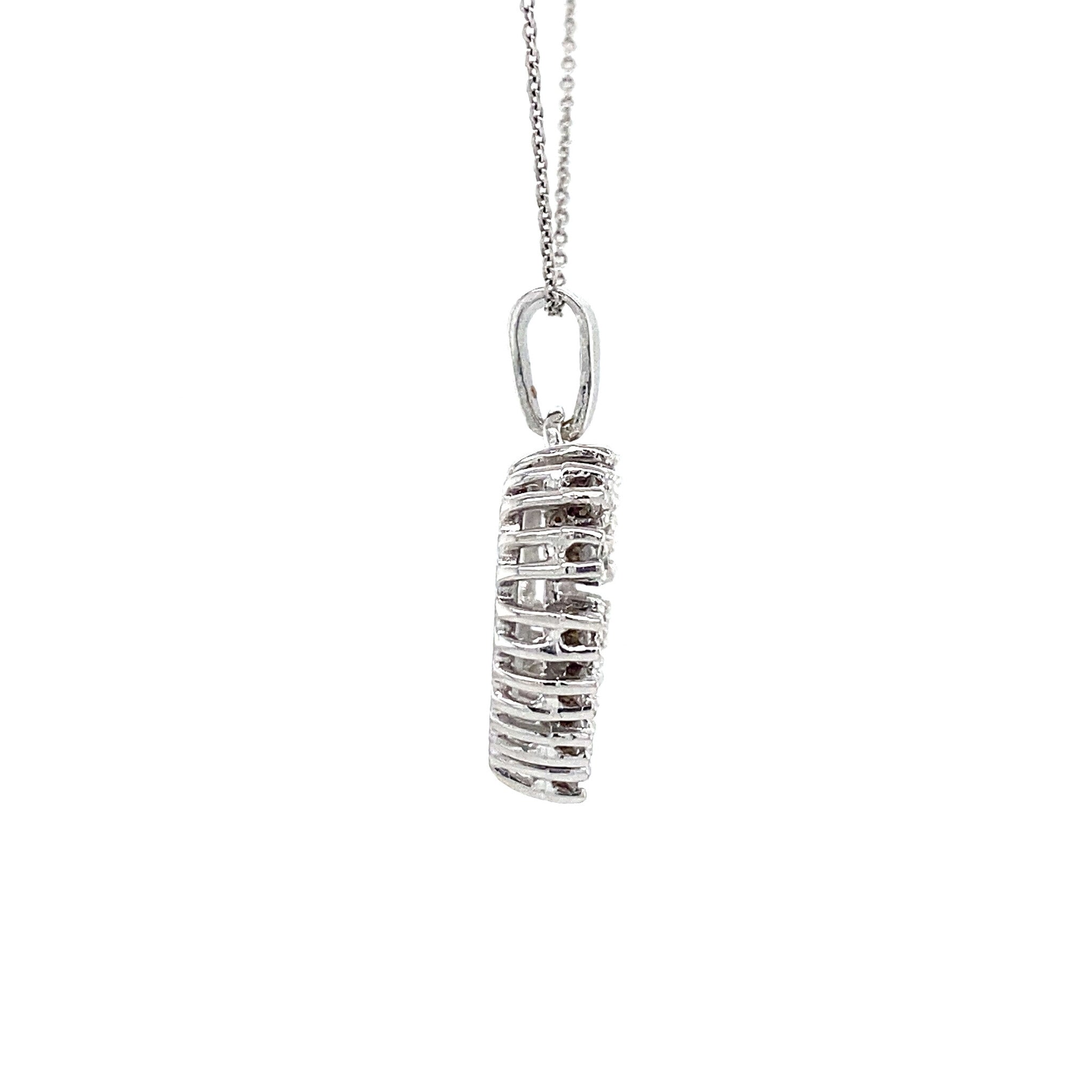 14 kt white gold heart pendant with diamond