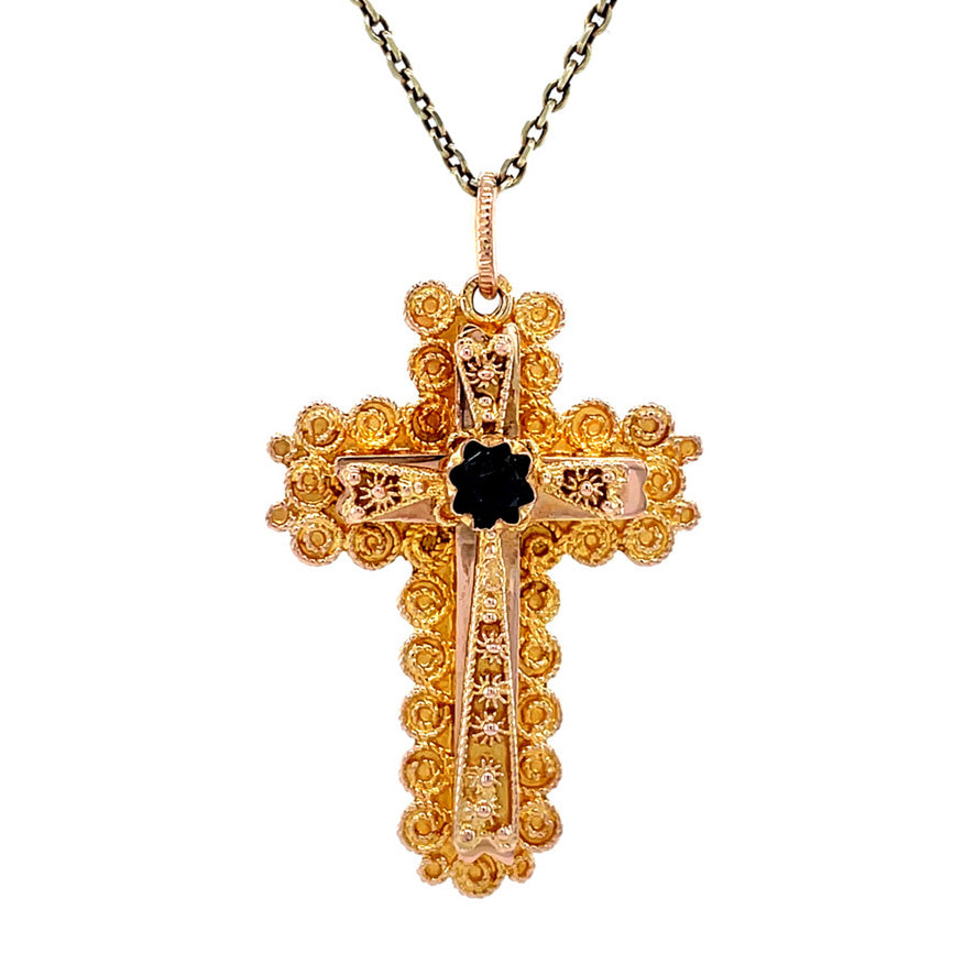 14 kt gold cross pendant with garnet