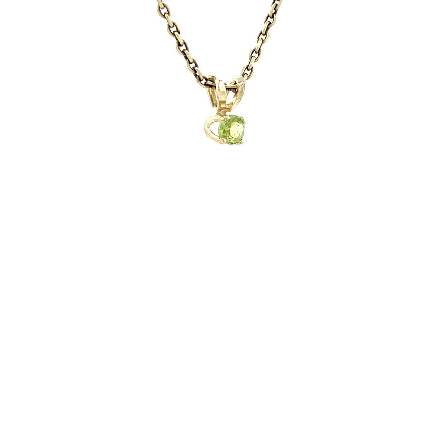 Golden vintage solitaire pendant with peridot 14 kt