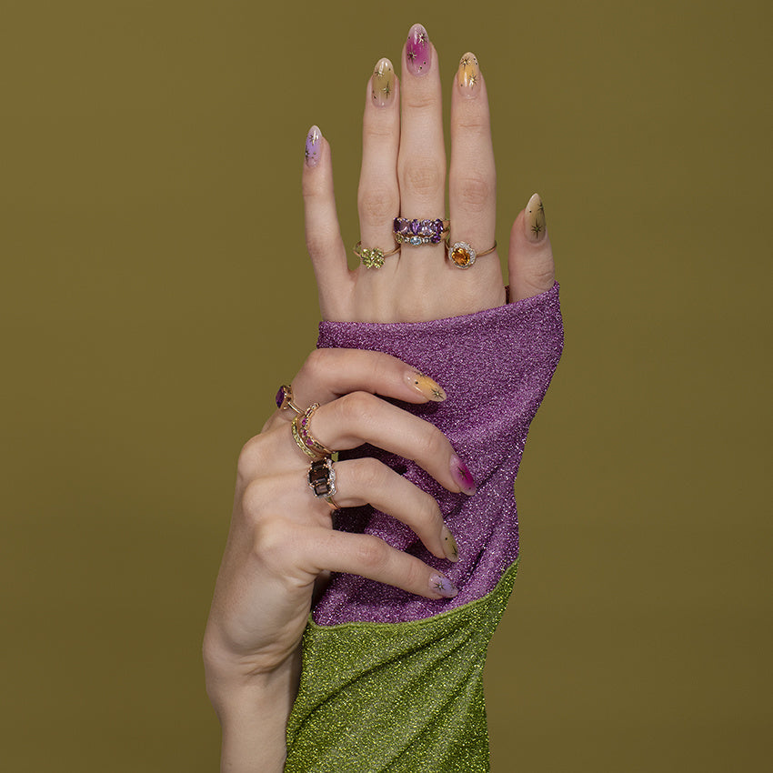 Ring met topaas, amethist, peridoot en diamant 9 kt