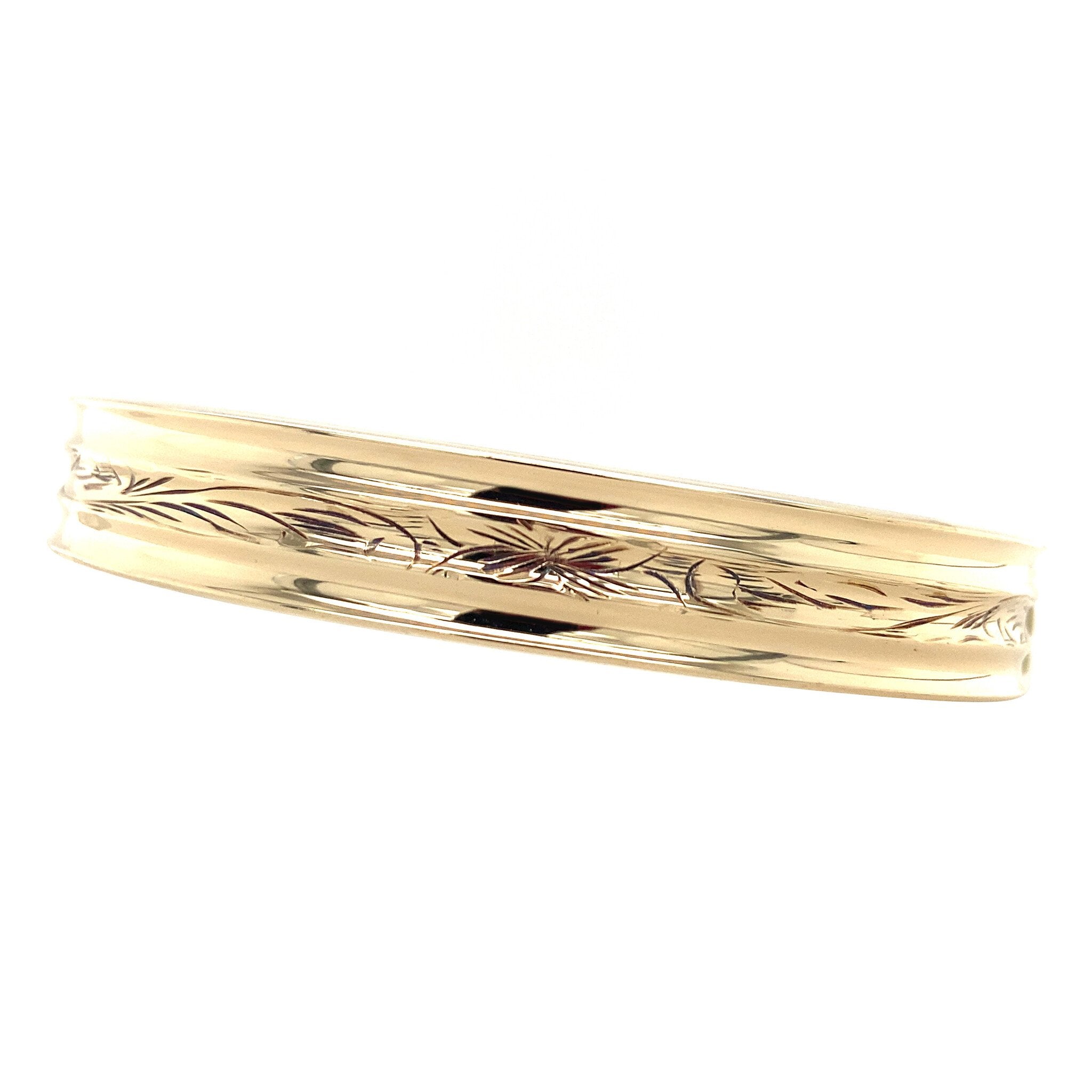 Gouden vintage bangle met gravure 14 krt