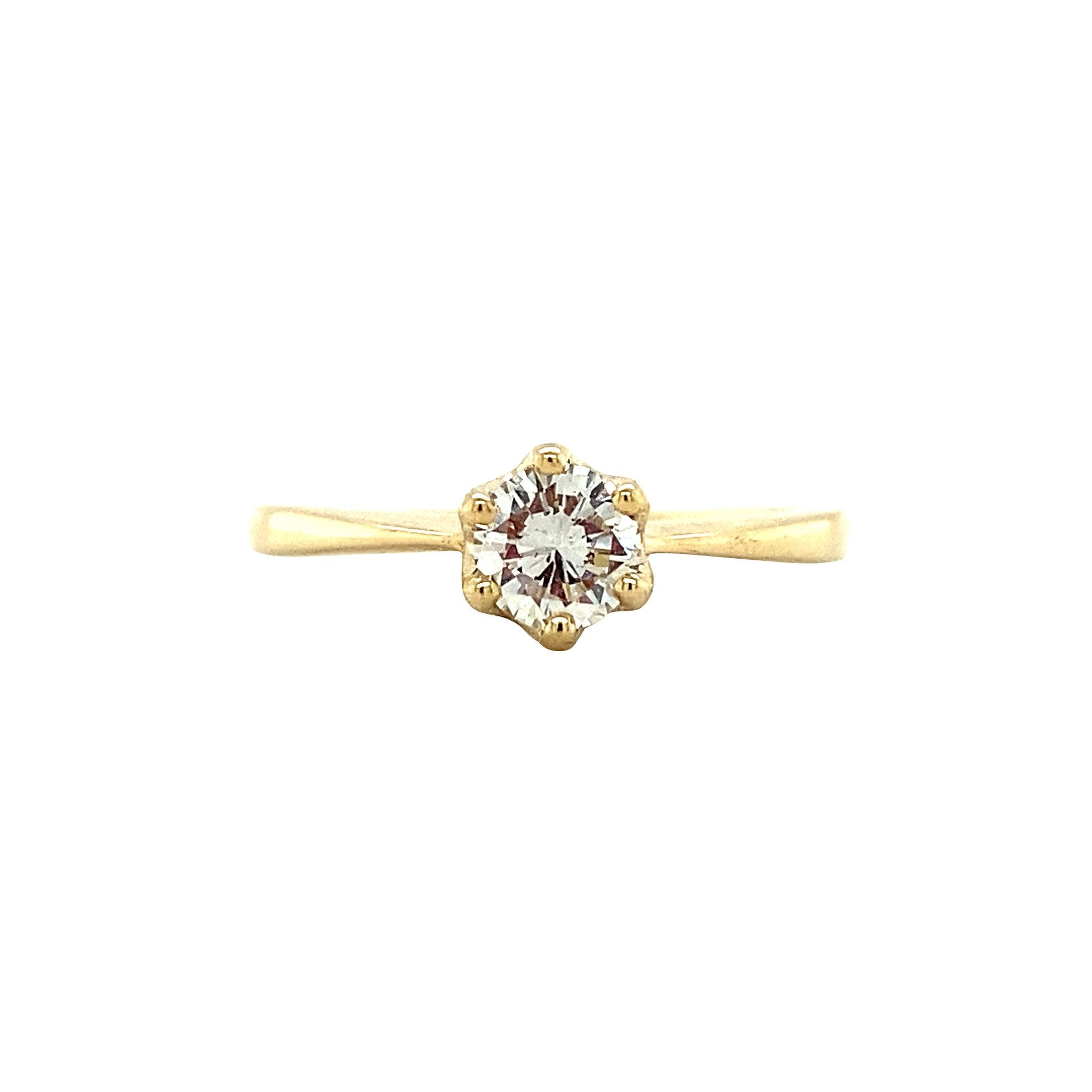 Gouden solitair ring met diamant 14 krt