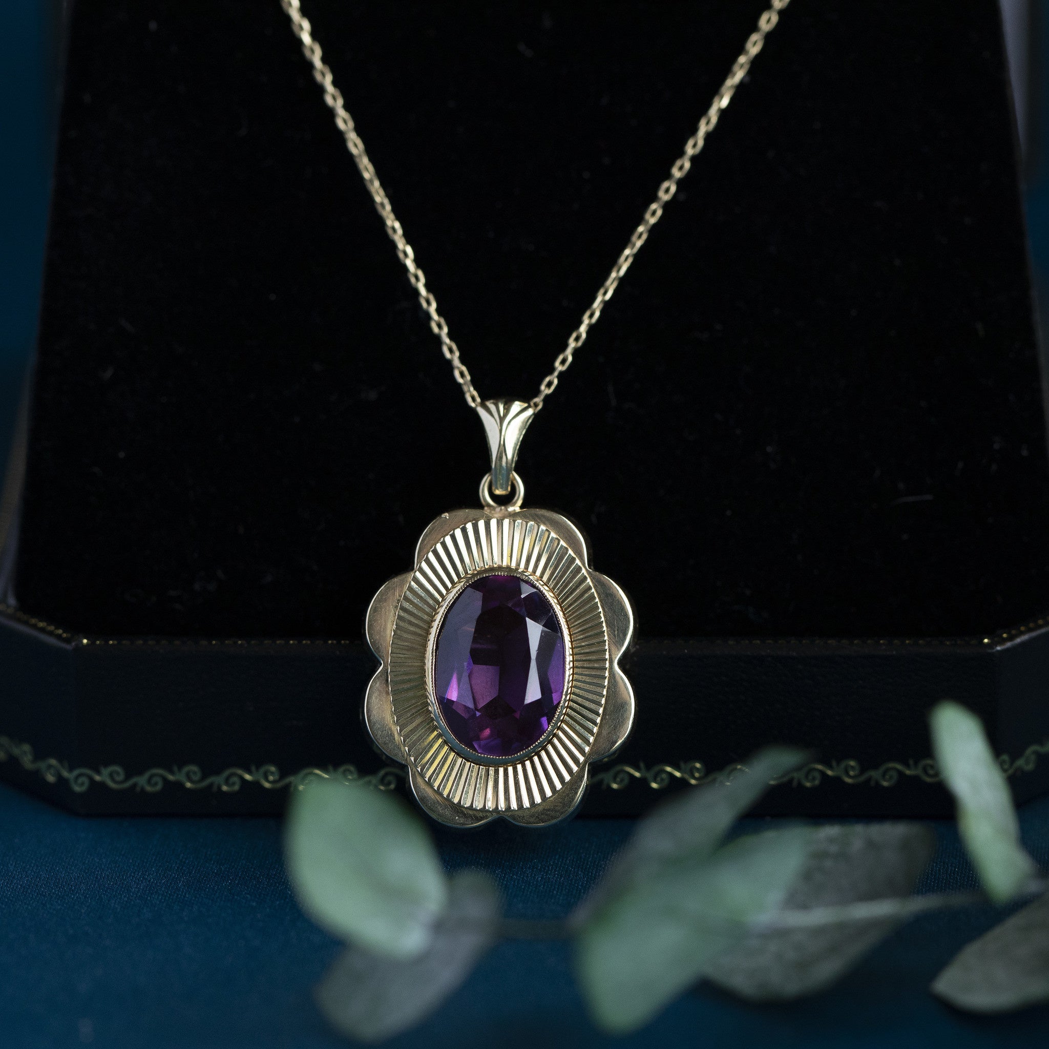 Gouden hanger met saffier 14 krt