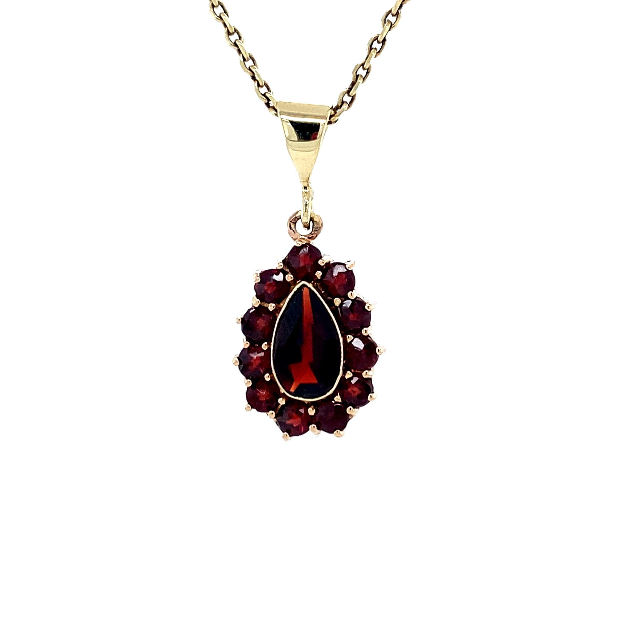 Vintage gold entourage pendant with garnet, 14 kt