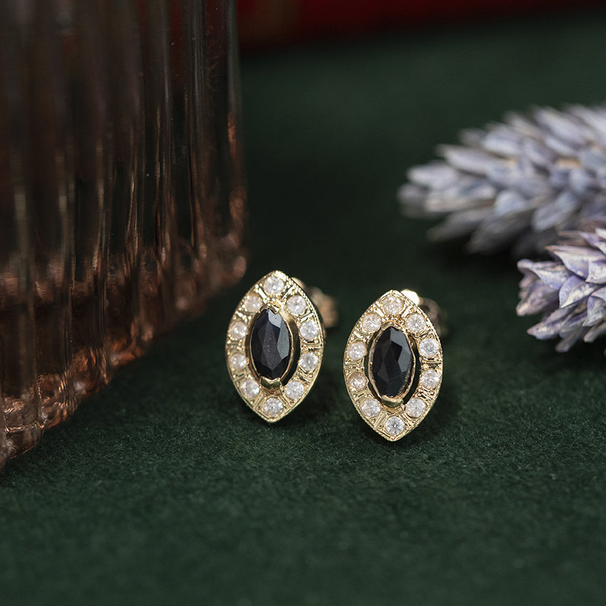 Gouden vintage entourage oorstekers met saffier 14 kt