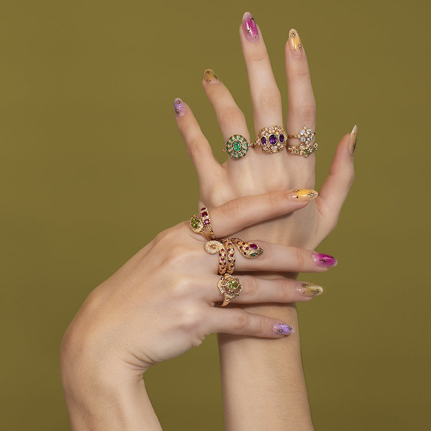 Gouden ring met smaragd, robijn en diamant 14 kt