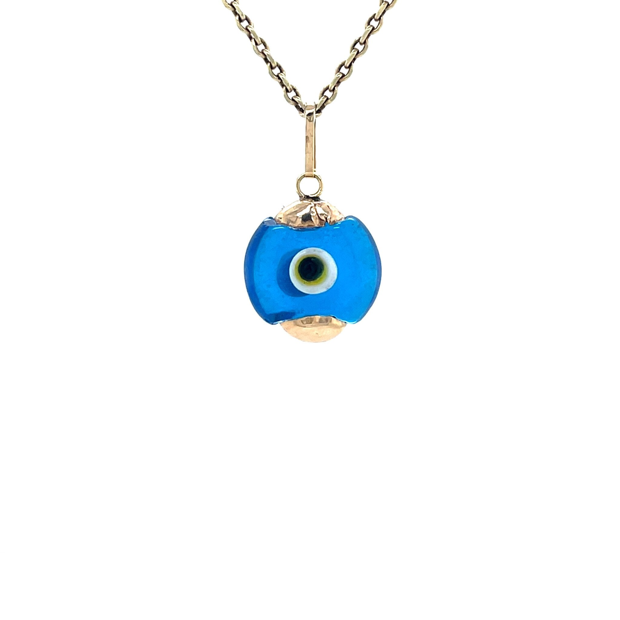 14 kt gold vintage evil eye pendant