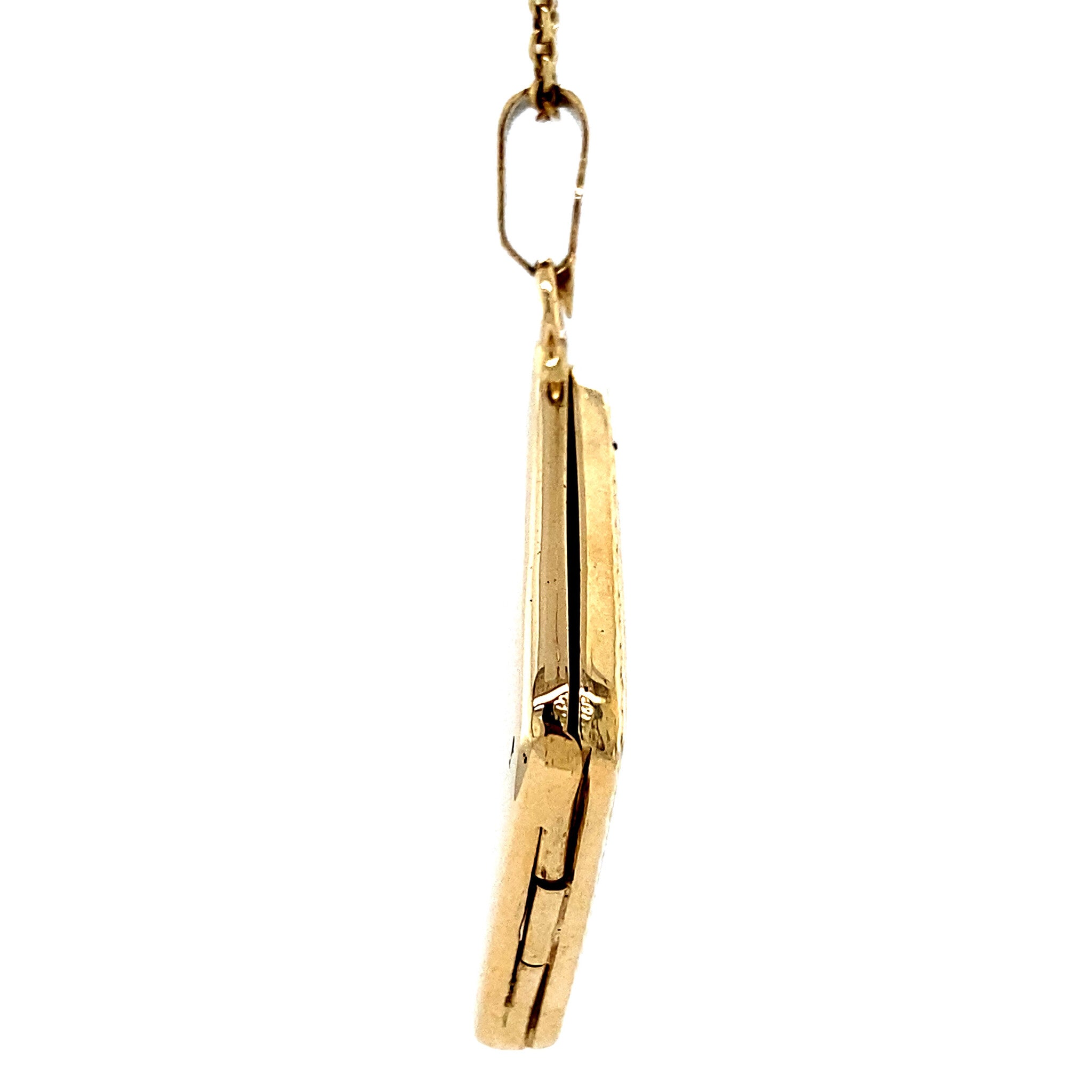 14 kt gold medallion with engraving