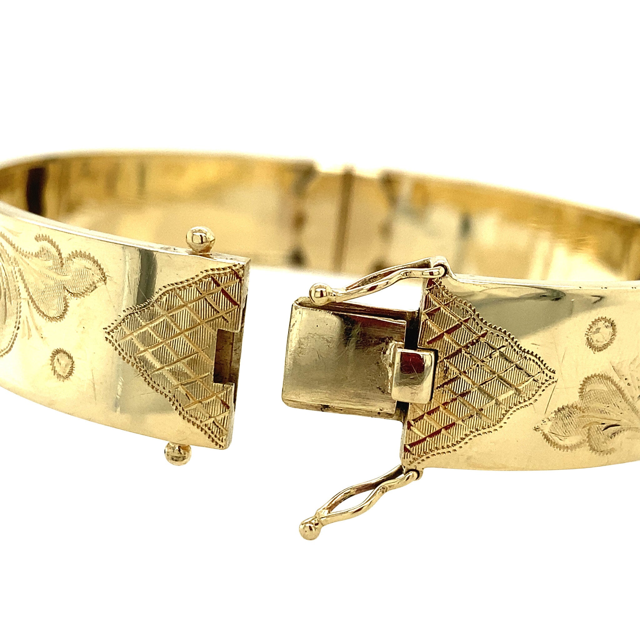 Vintage gouden bangle met gravure 14 krt