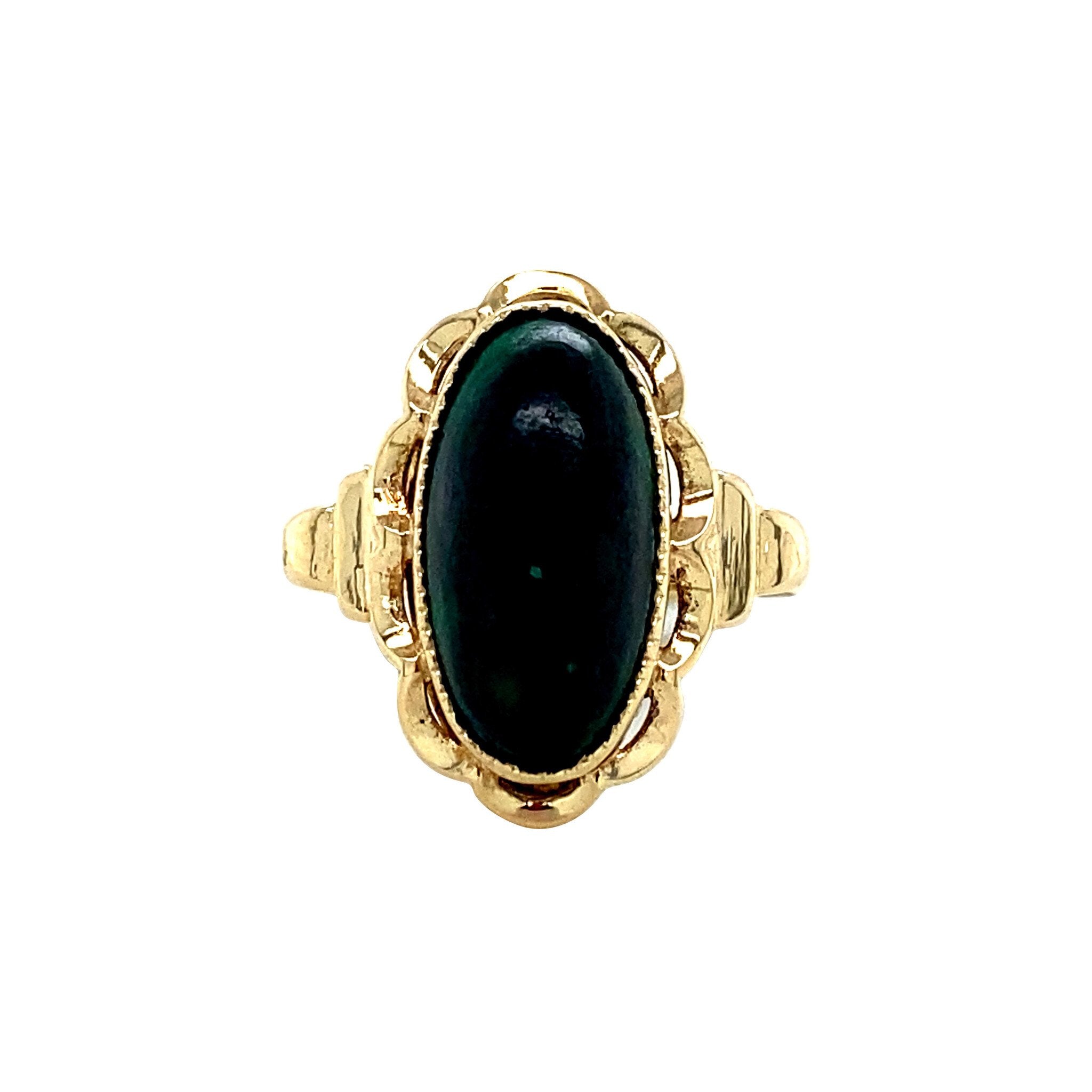 Gold ring with malachite, 14 kt
