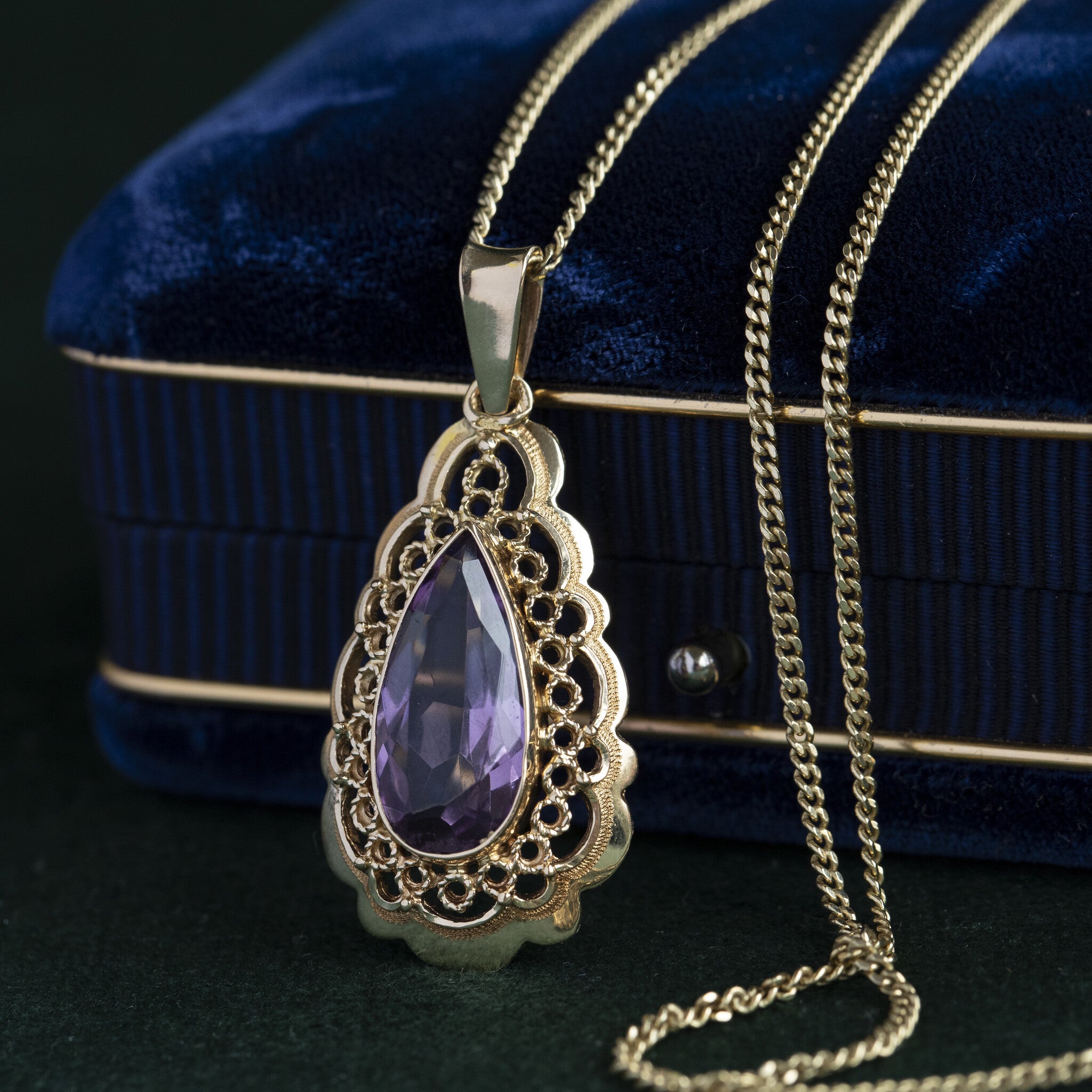 Gouden hanger met amethist 14 krt