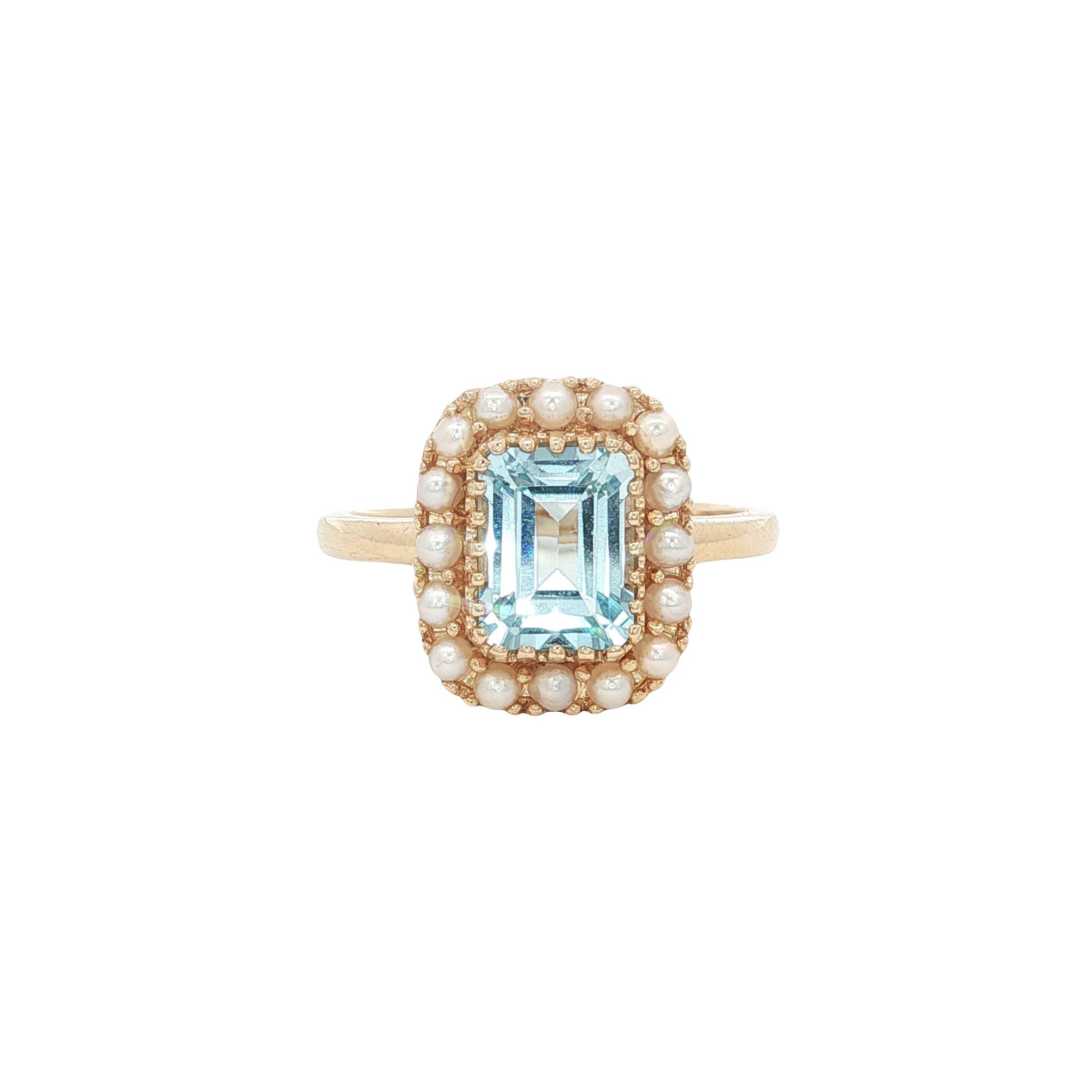 Gouden ring met blauwe topaas en parel 14 kt