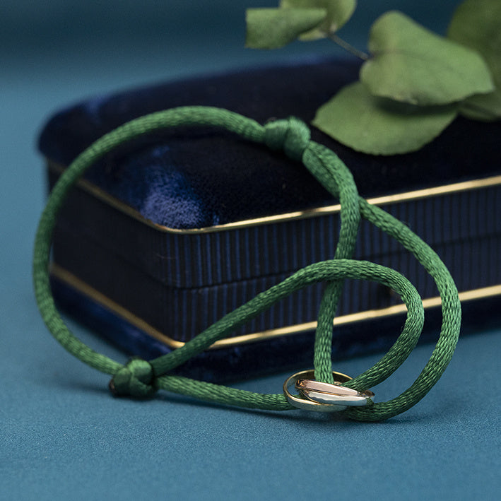 Satin bracelet with trinity link 14 kt