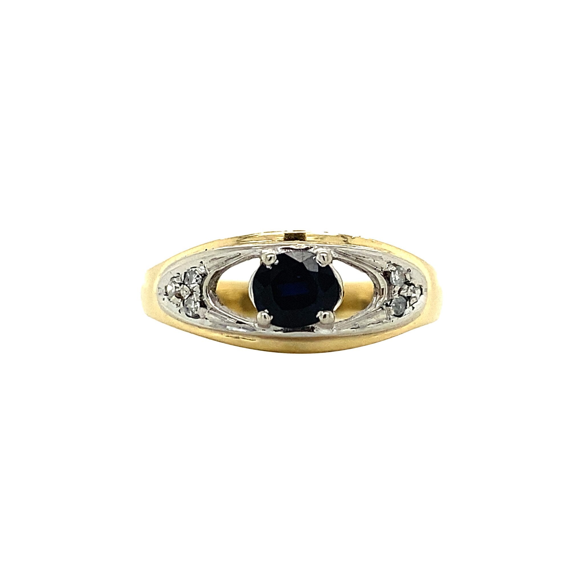 18 kt gold ring with sapphire and diamond