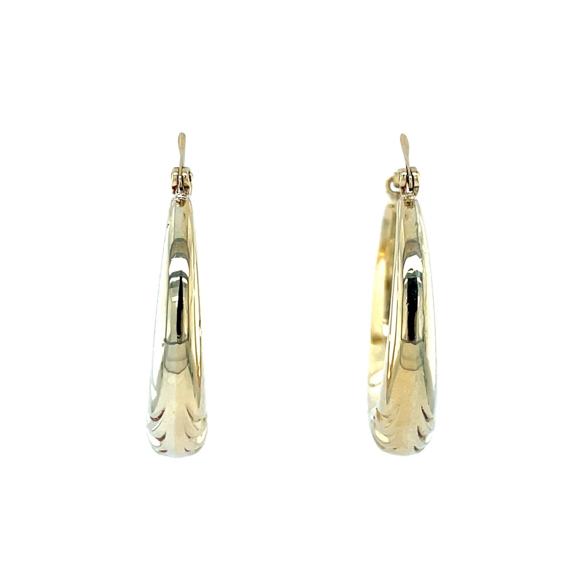 Vintage 14 kt gold fantasy hoop earrings