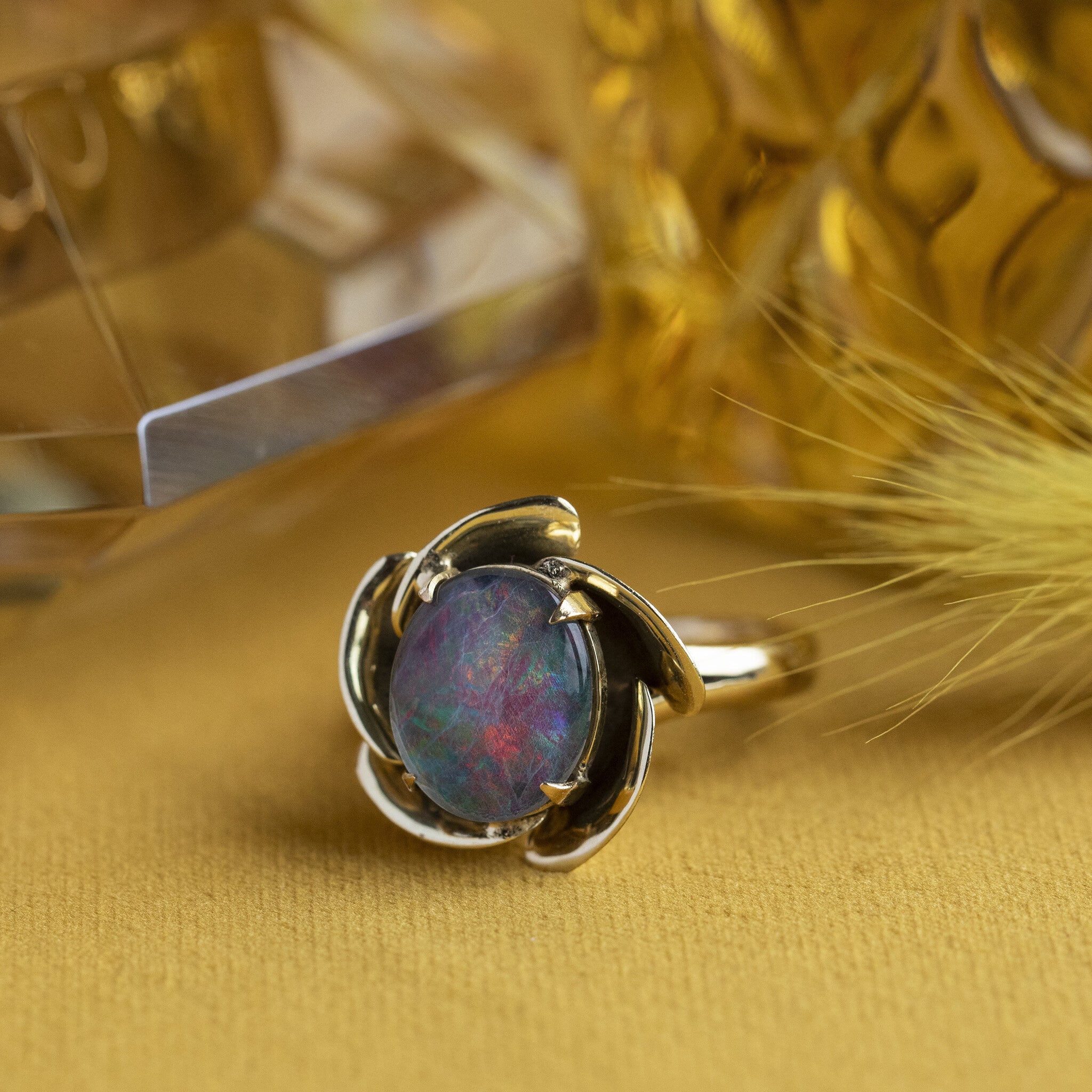 Gouden ring met triplet 14 krt
