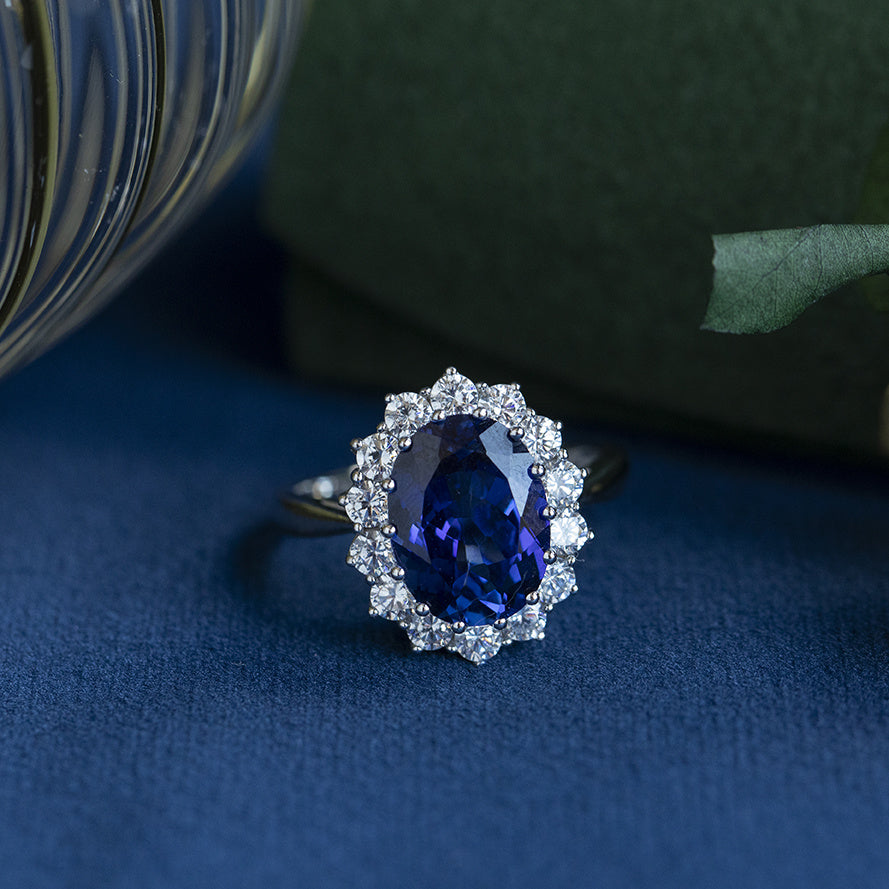 14 kt white gold cluster ring with sapphire and zirconia