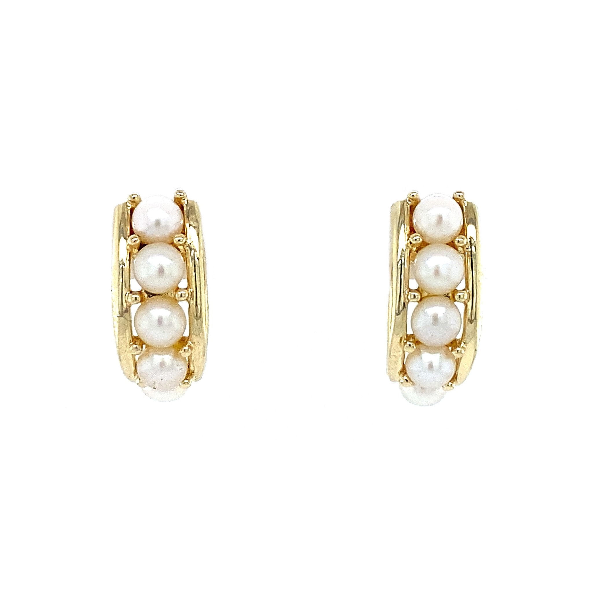 14 kt gold pearl stud earrings