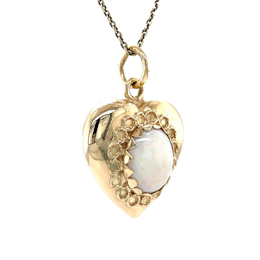 Golden vintage heart pendant with opal 14 kt