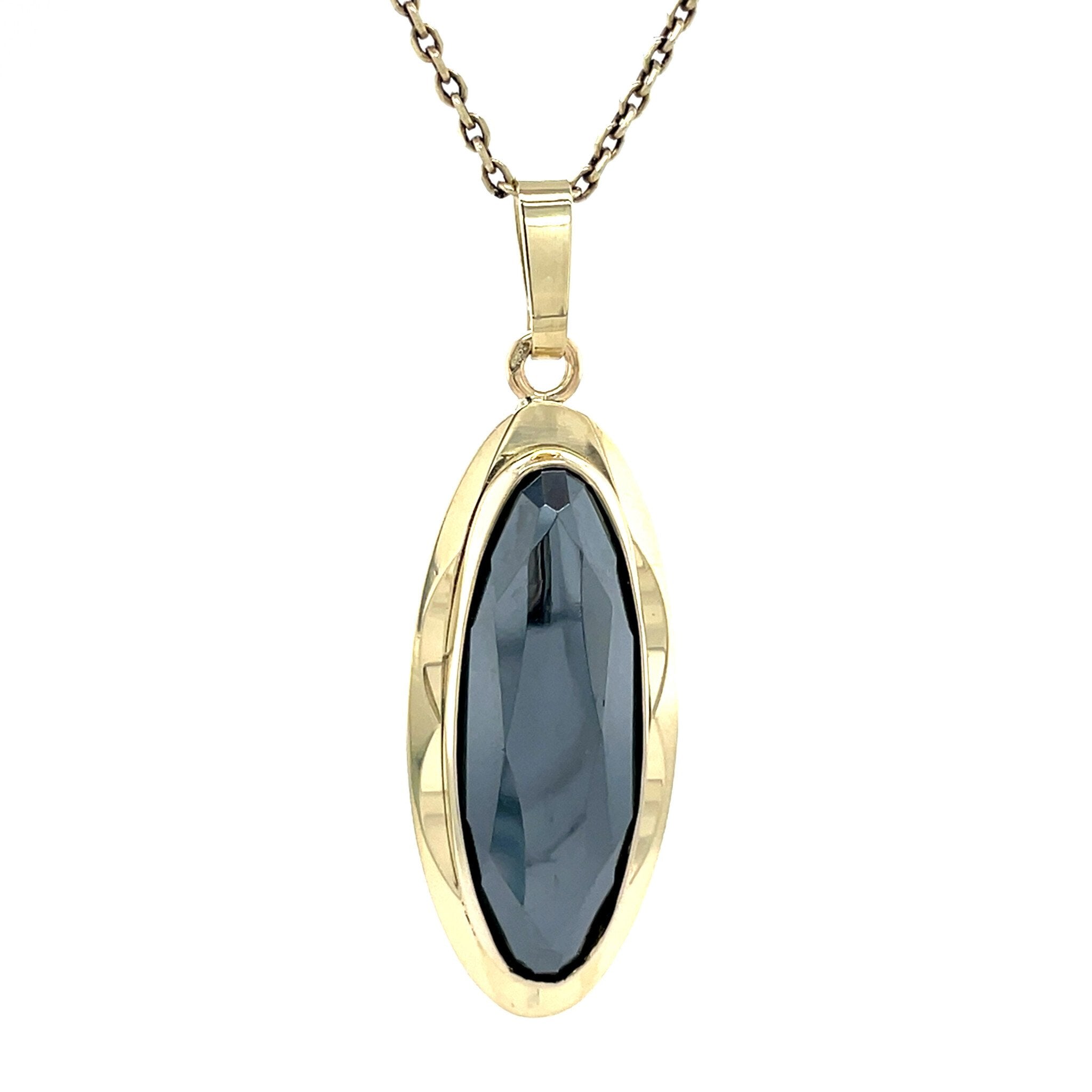 Gouden vintage hanger met hematiet 14 krt