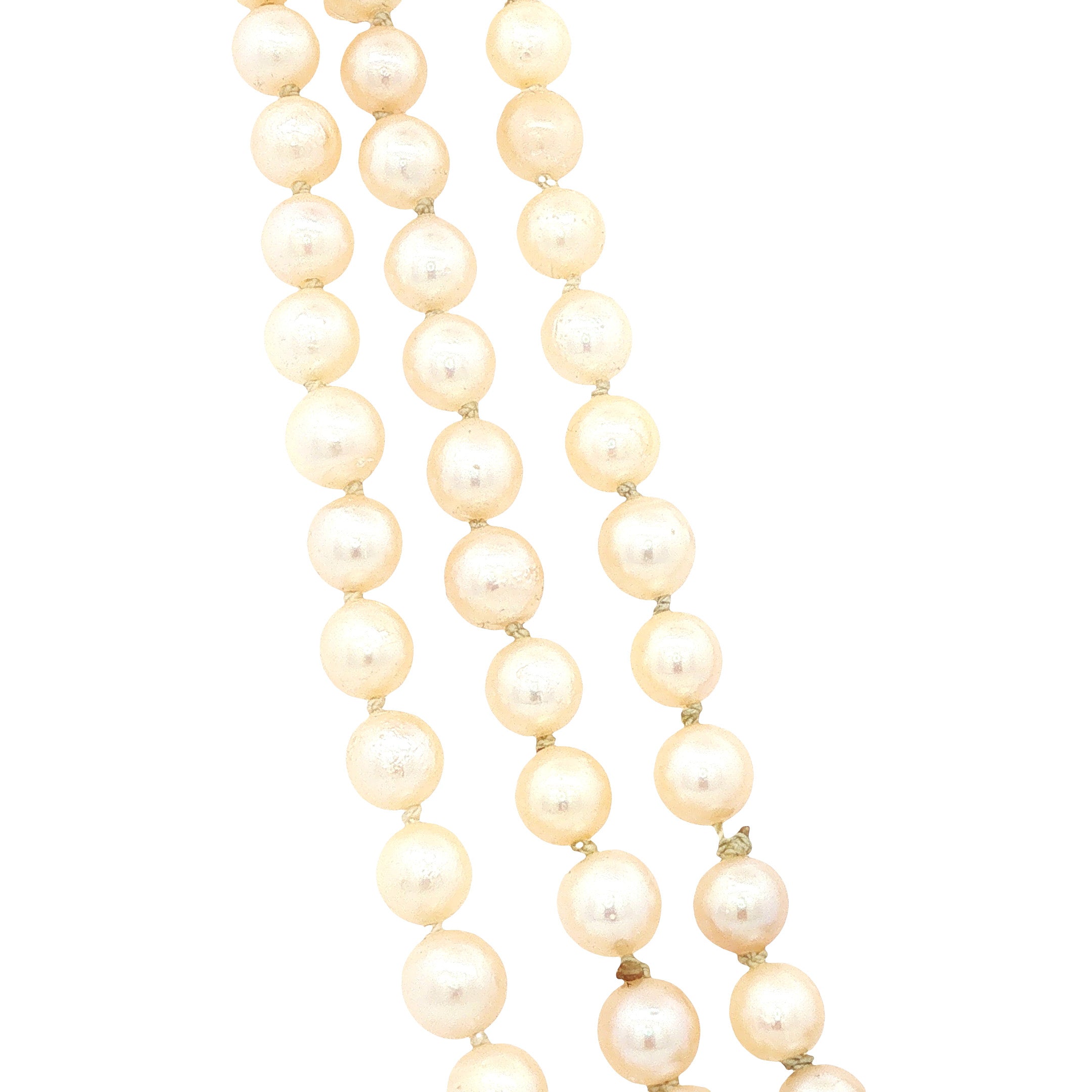 Vintage pearl necklace with white gold clasp set with a diamond and a pearl, 18 kt
