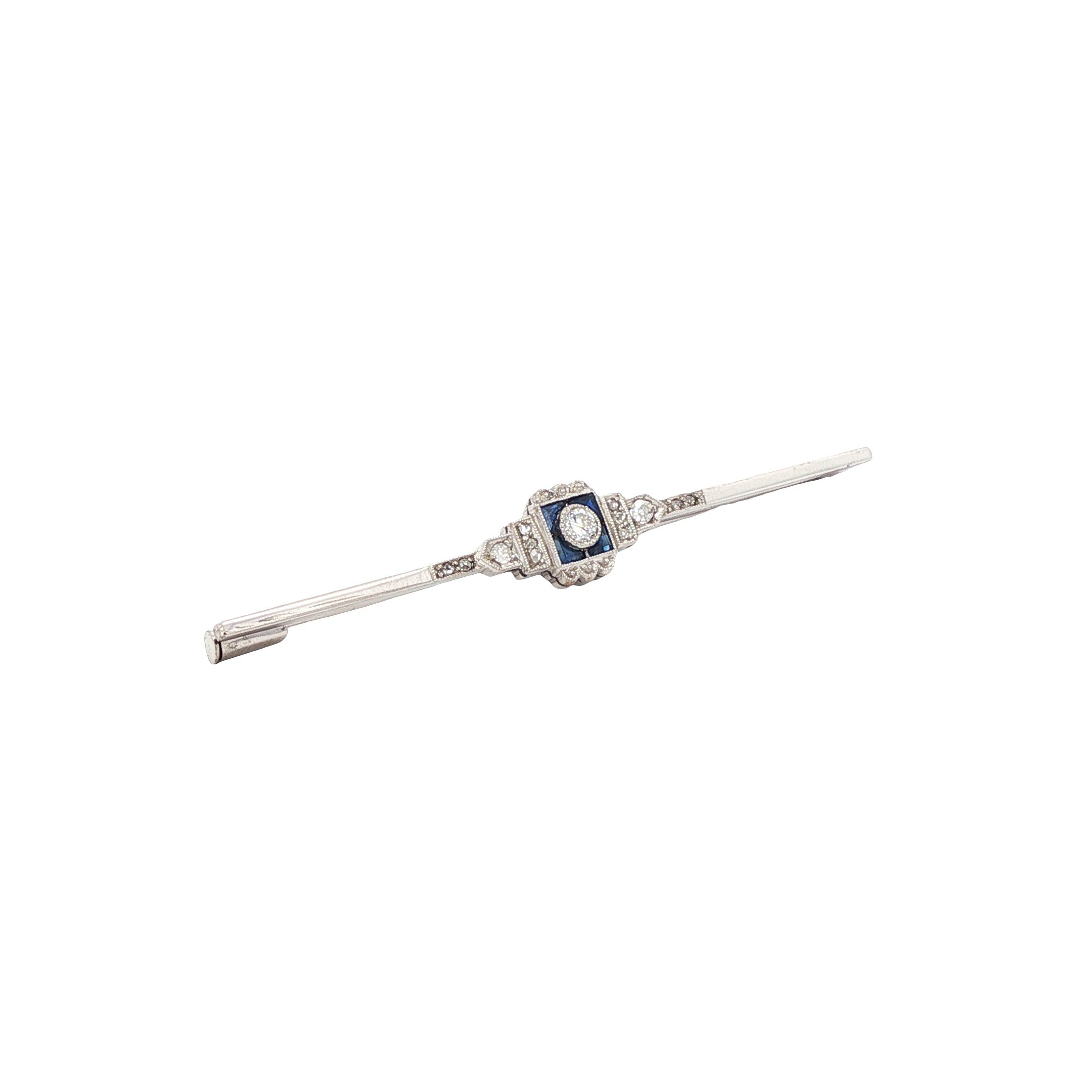 White gold brooch with sapphire and diamond 18 kt/850