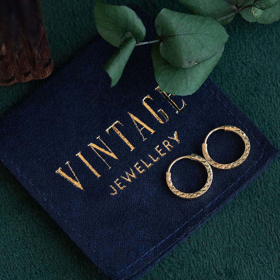 Gold fantasy earrings 14 kt
