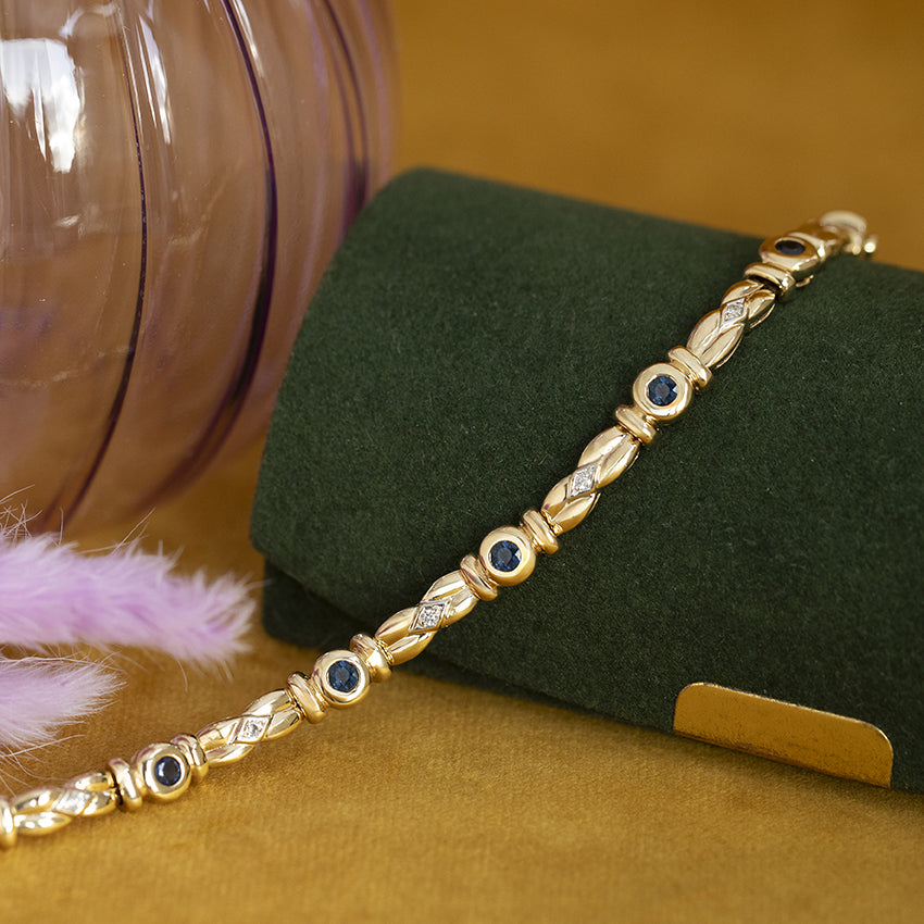 Gouden armband met saffier en diamant 14 kt
