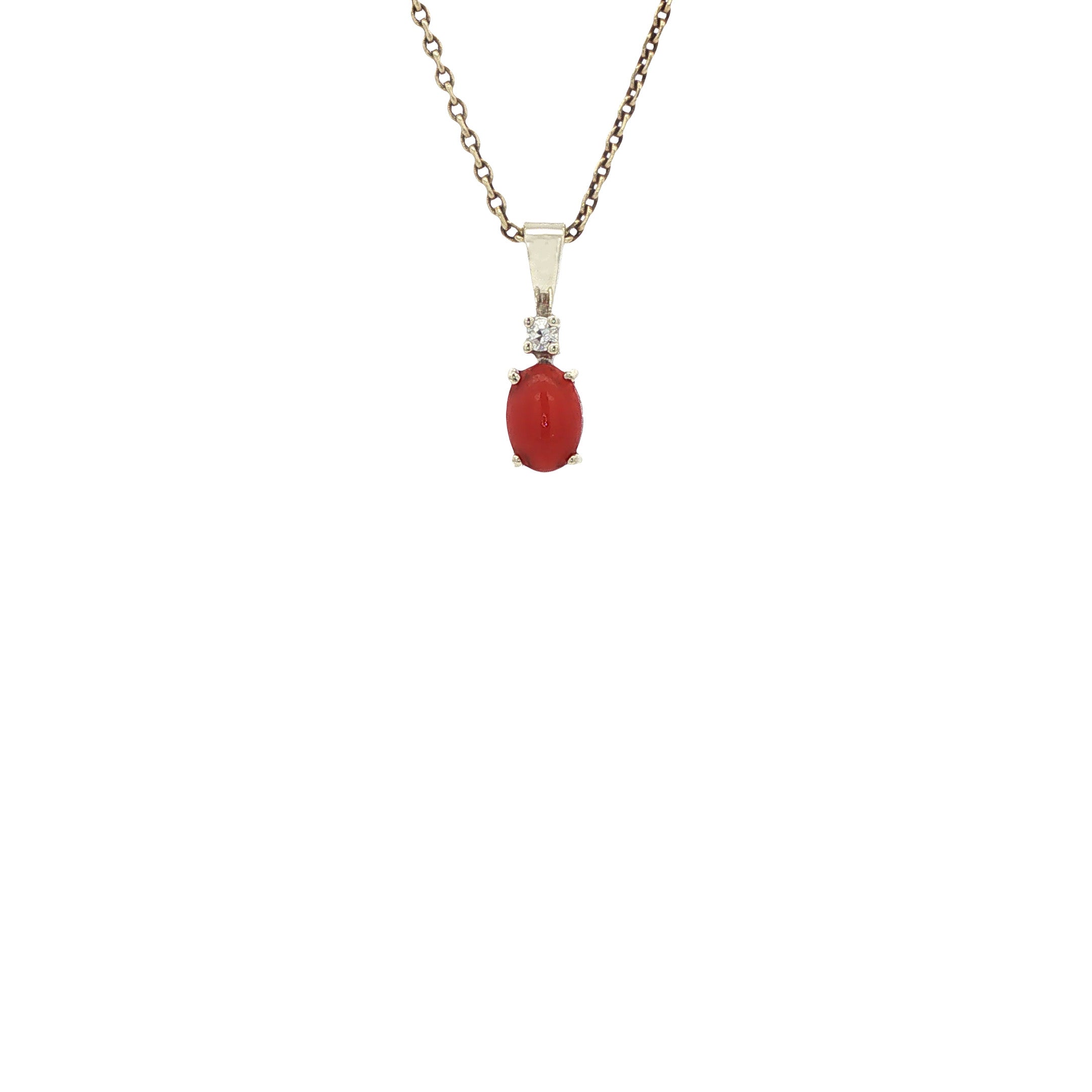 Vintage pendant with blood coral and an 8 kt diamond