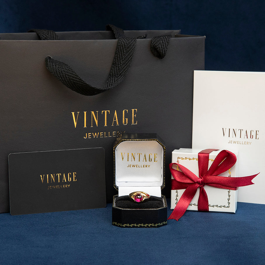 Gouden ring met robijn 18 kt