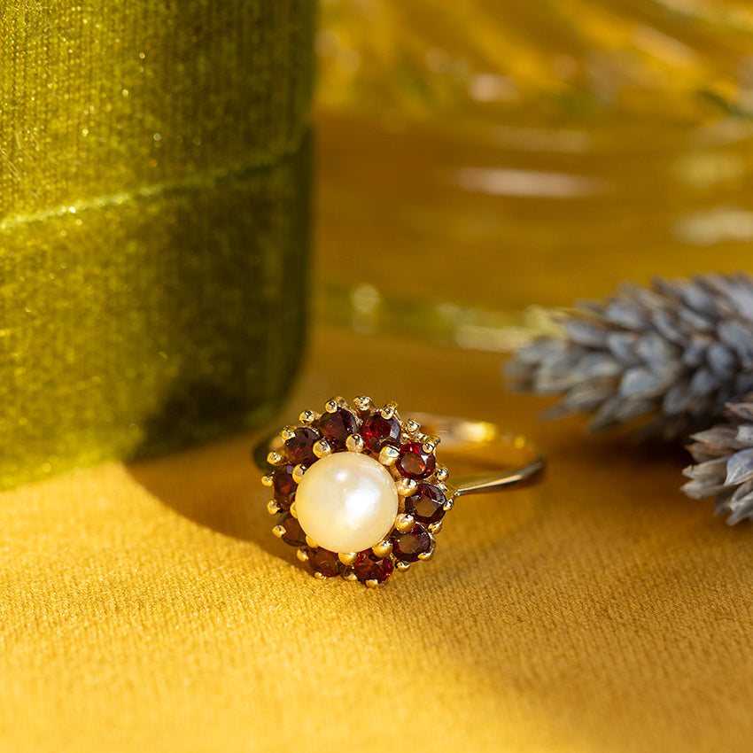 Gouden ring met parel en granaat 14 kt