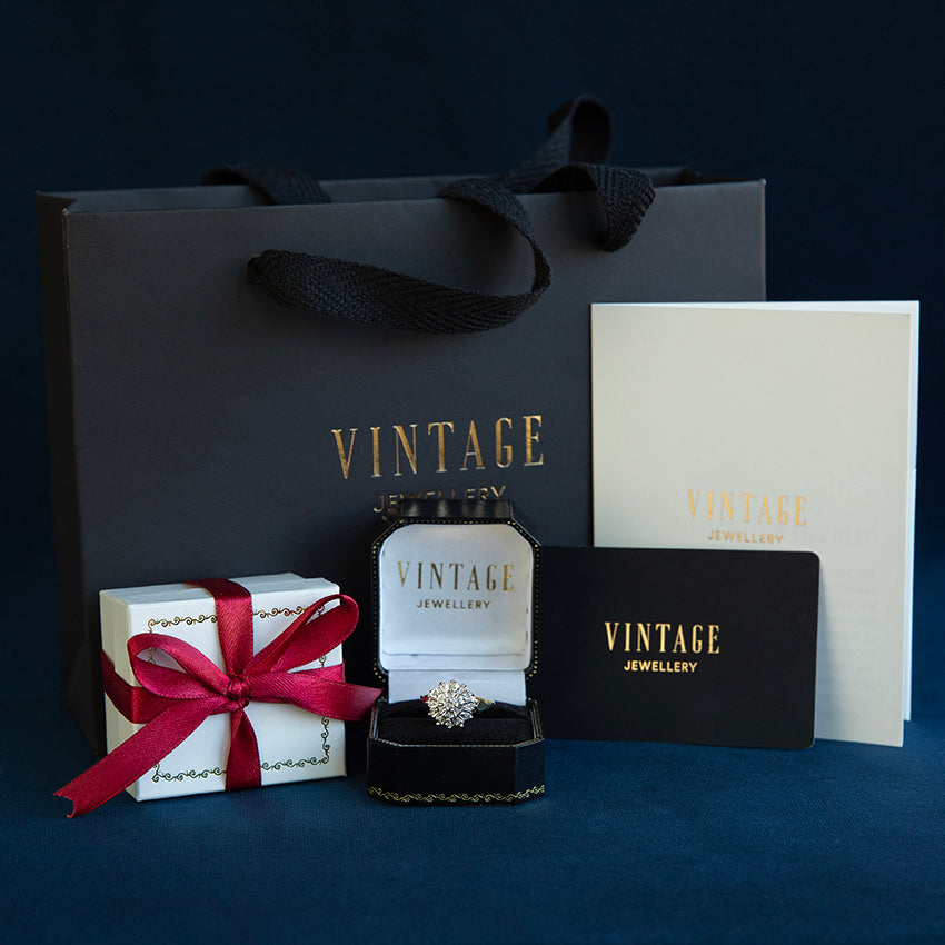 Gold ring with diamond and pearl 18 kt