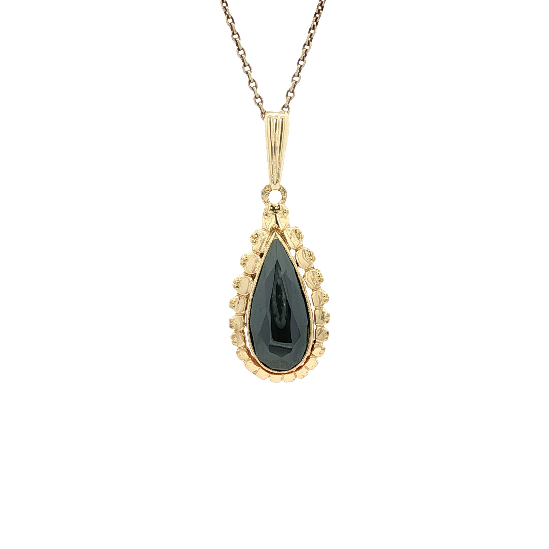 14 kt gold pendant with hematite