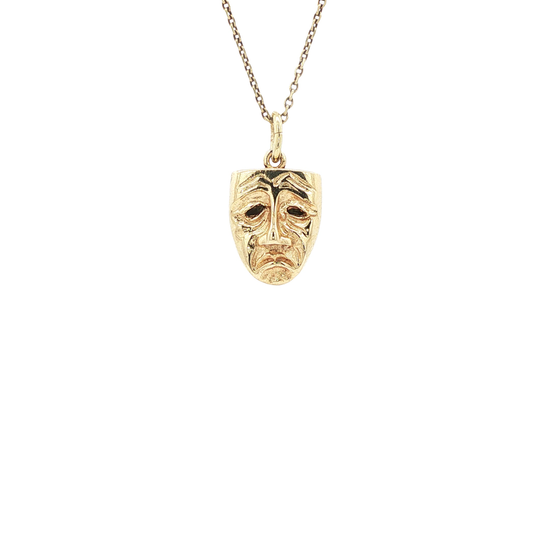 Vintage mask pendant 8 kt