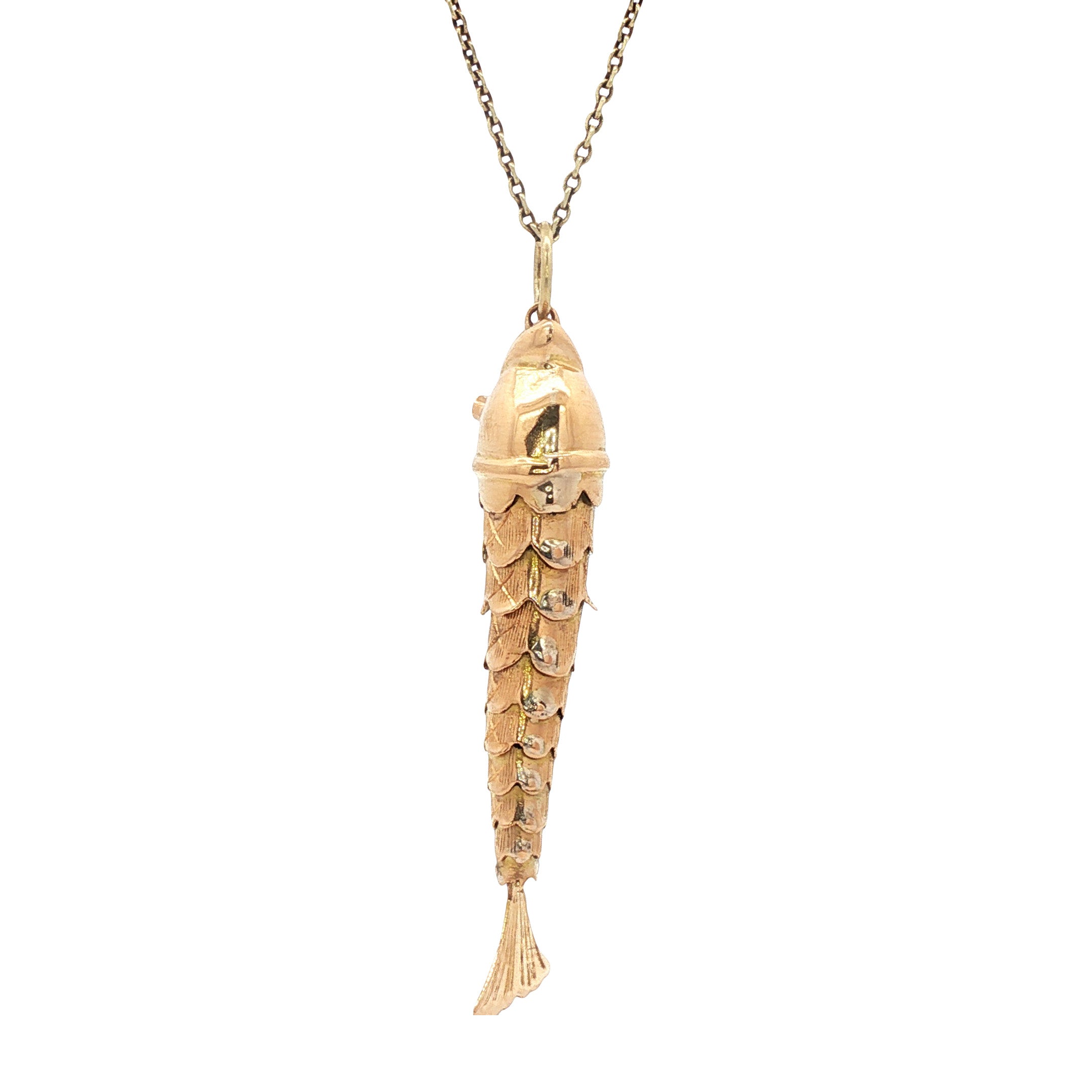 Gold fish pendant with ruby 14 kt
