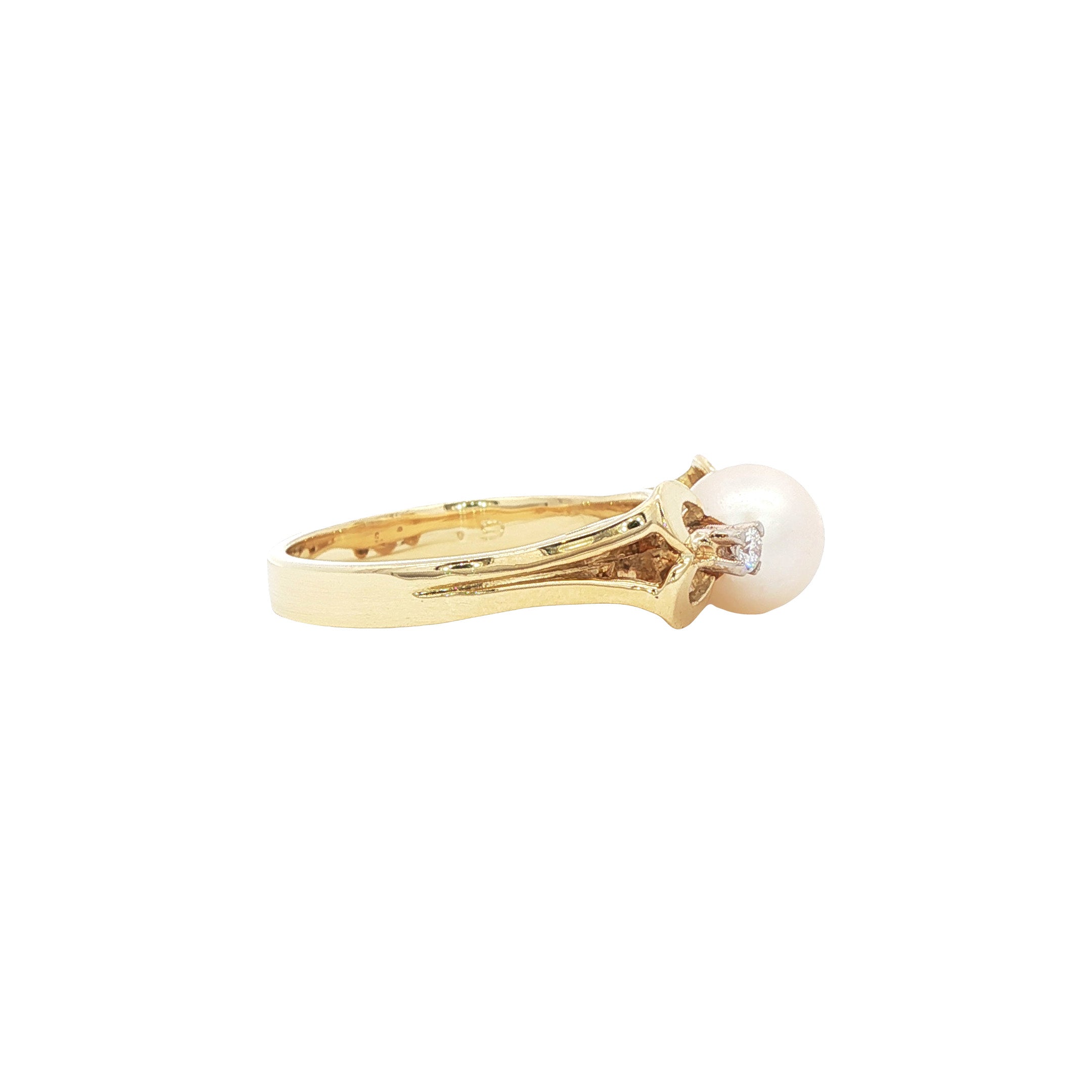 Gouden vintage ring met parel en diamant 14 kt