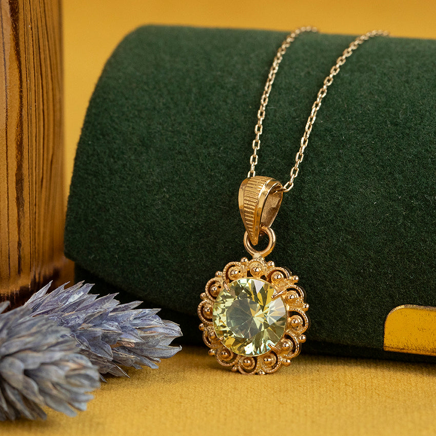 Gouden hanger met saffier 22 kt