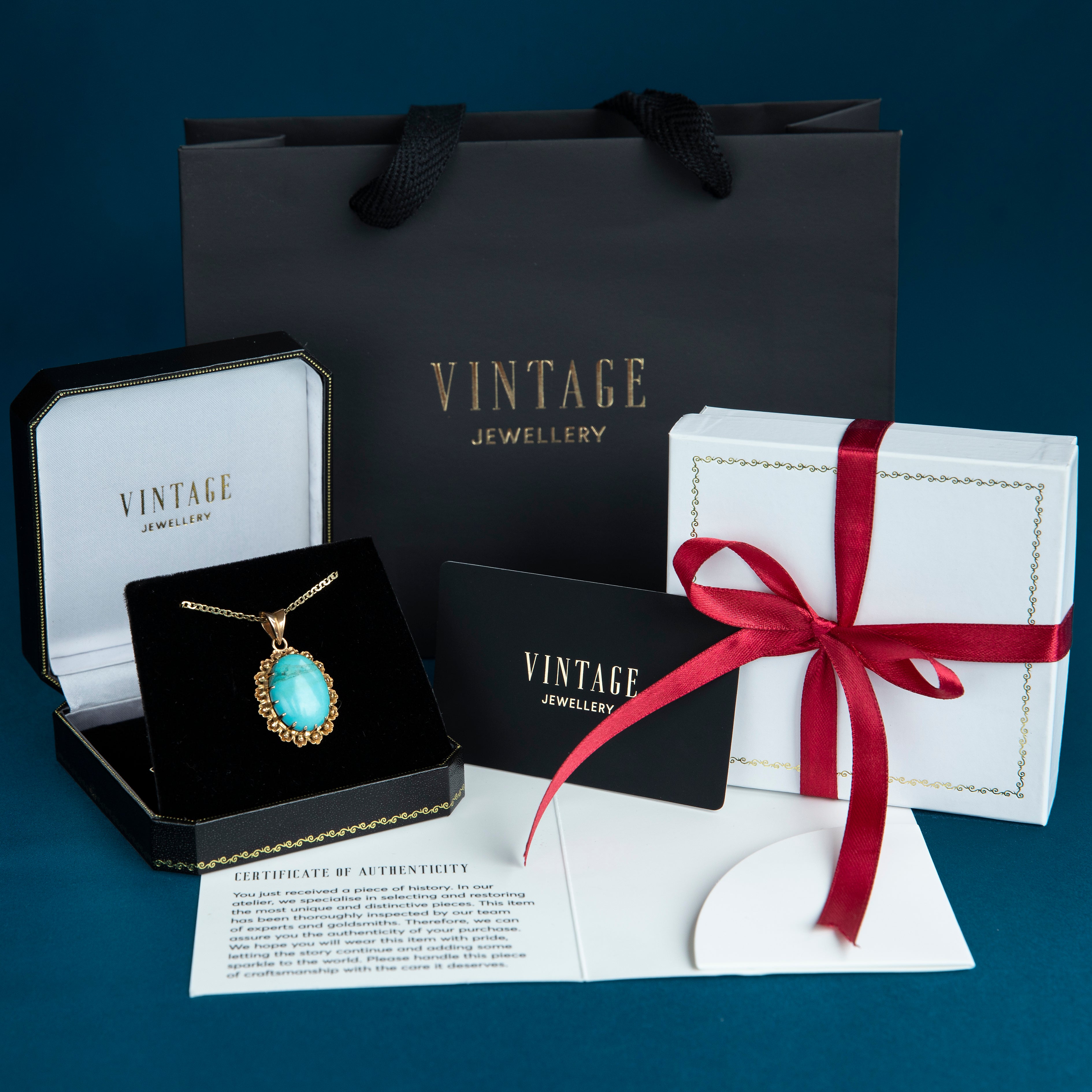 Hanger met onyx en parel 9 kt