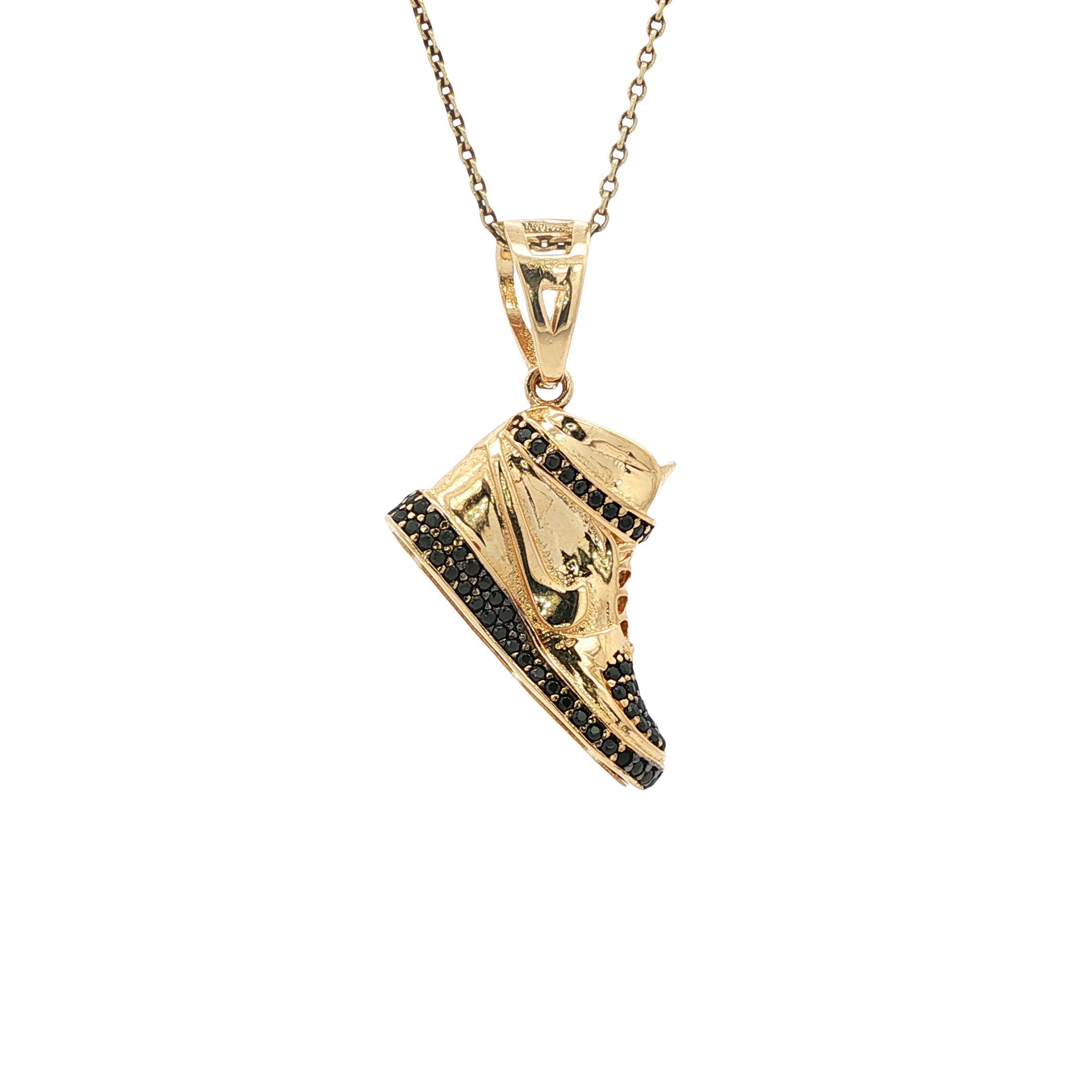 Vintage gold Nike shoe pendant with zirconia, 14 kt
