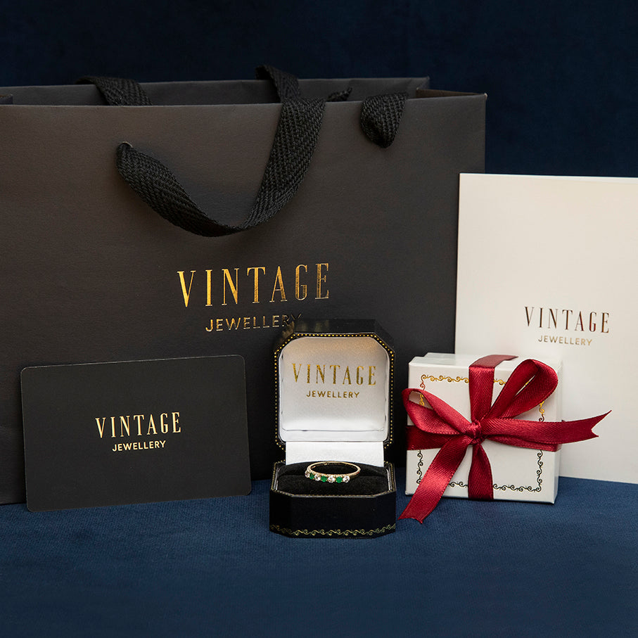 Gouden vintage ring met saffier en diamant 14 kt